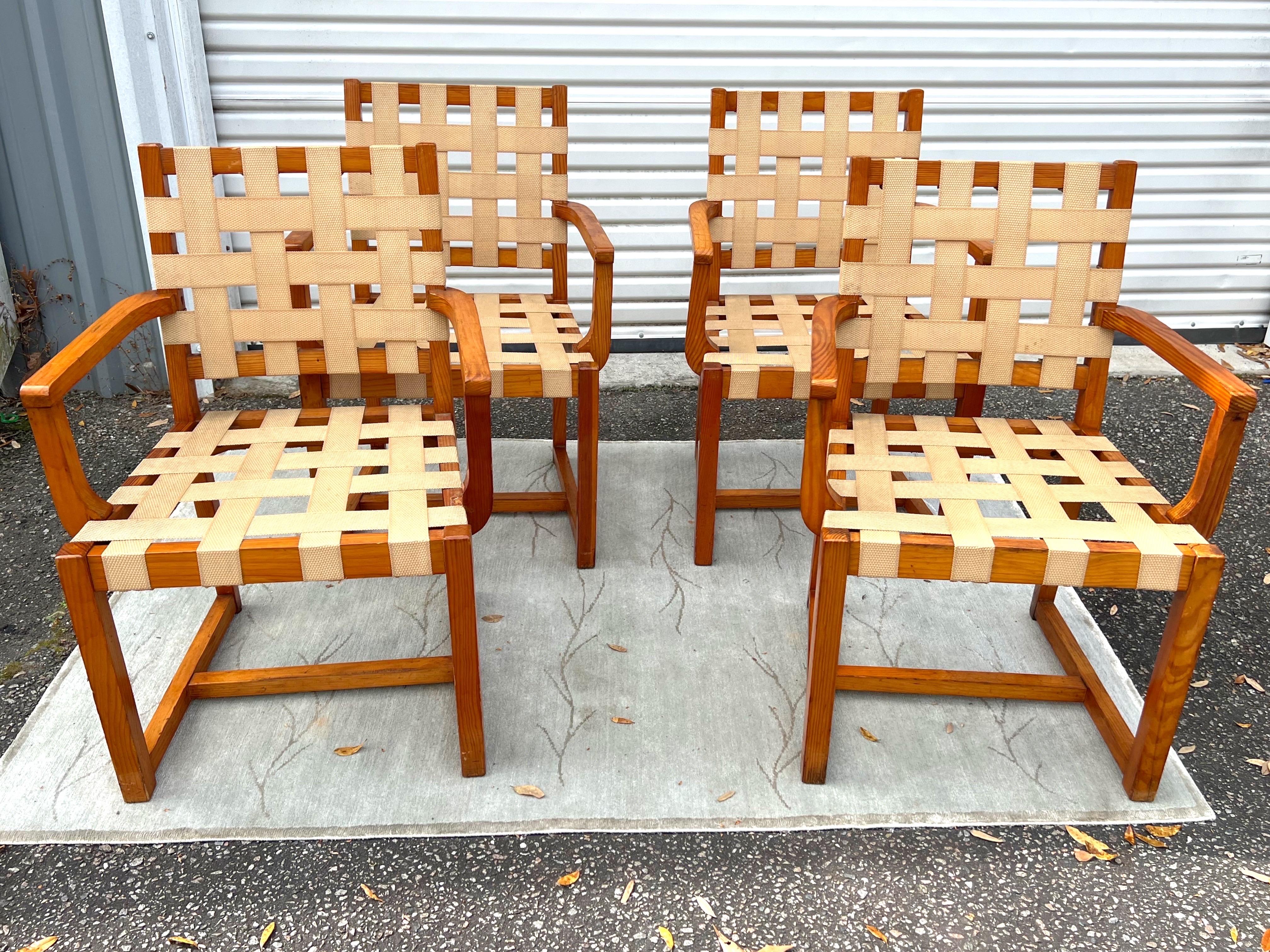 Stunning set of 4 rare midcentury Mexican pine and woven palm dining or side chairs by Michael van Beuren circa 1950s. Gorgeous vintage condition. One chair was clearly used more and repairs have been made. A full life left in these beauts! With the