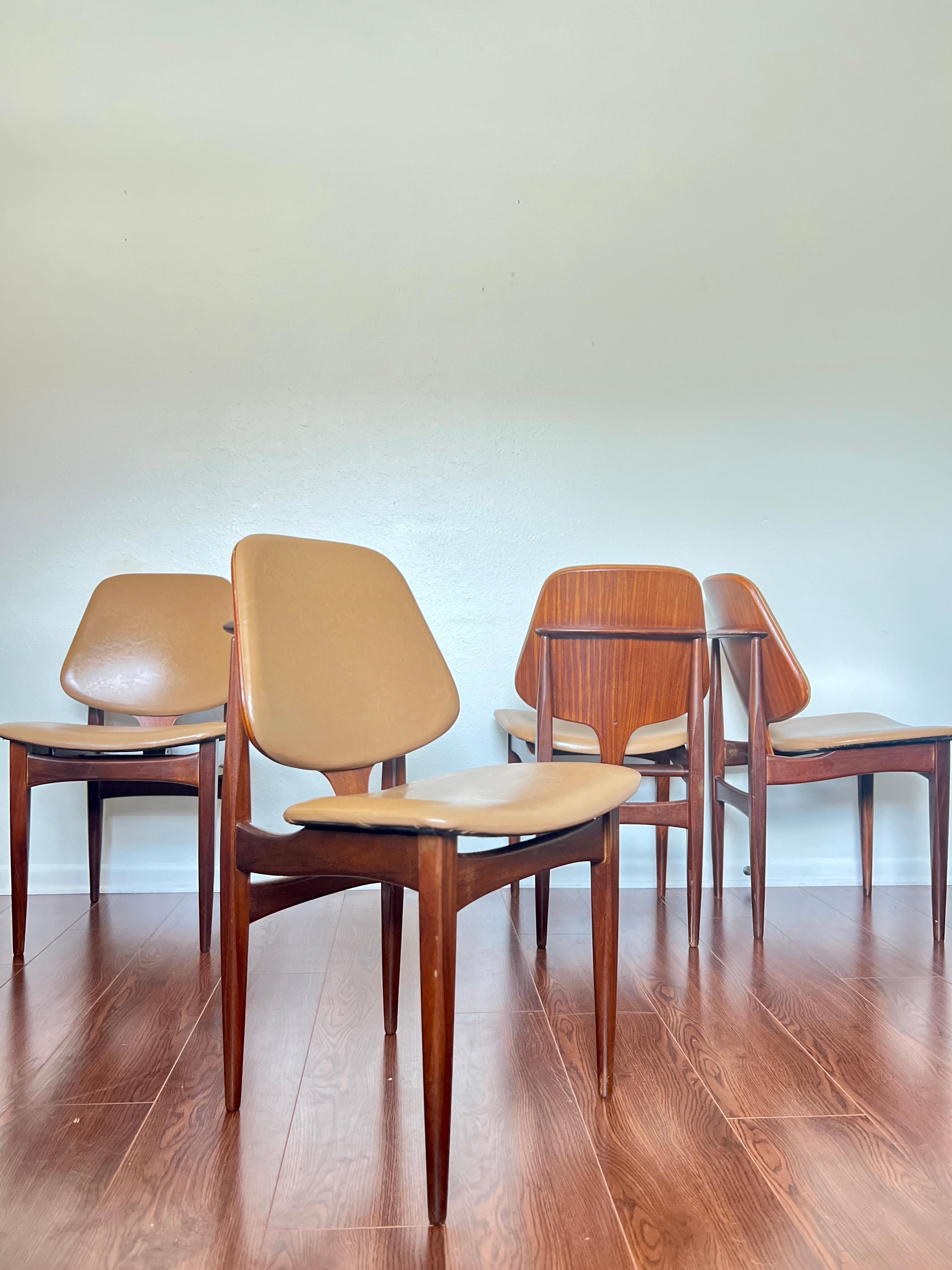 A set of 4 mid century modern dining chairs by Elliots of Newbury 1