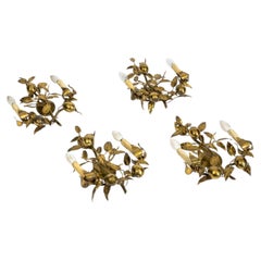 A set of 4 midcentuty brass sculptural lemon sconces, attr. Maison Roche