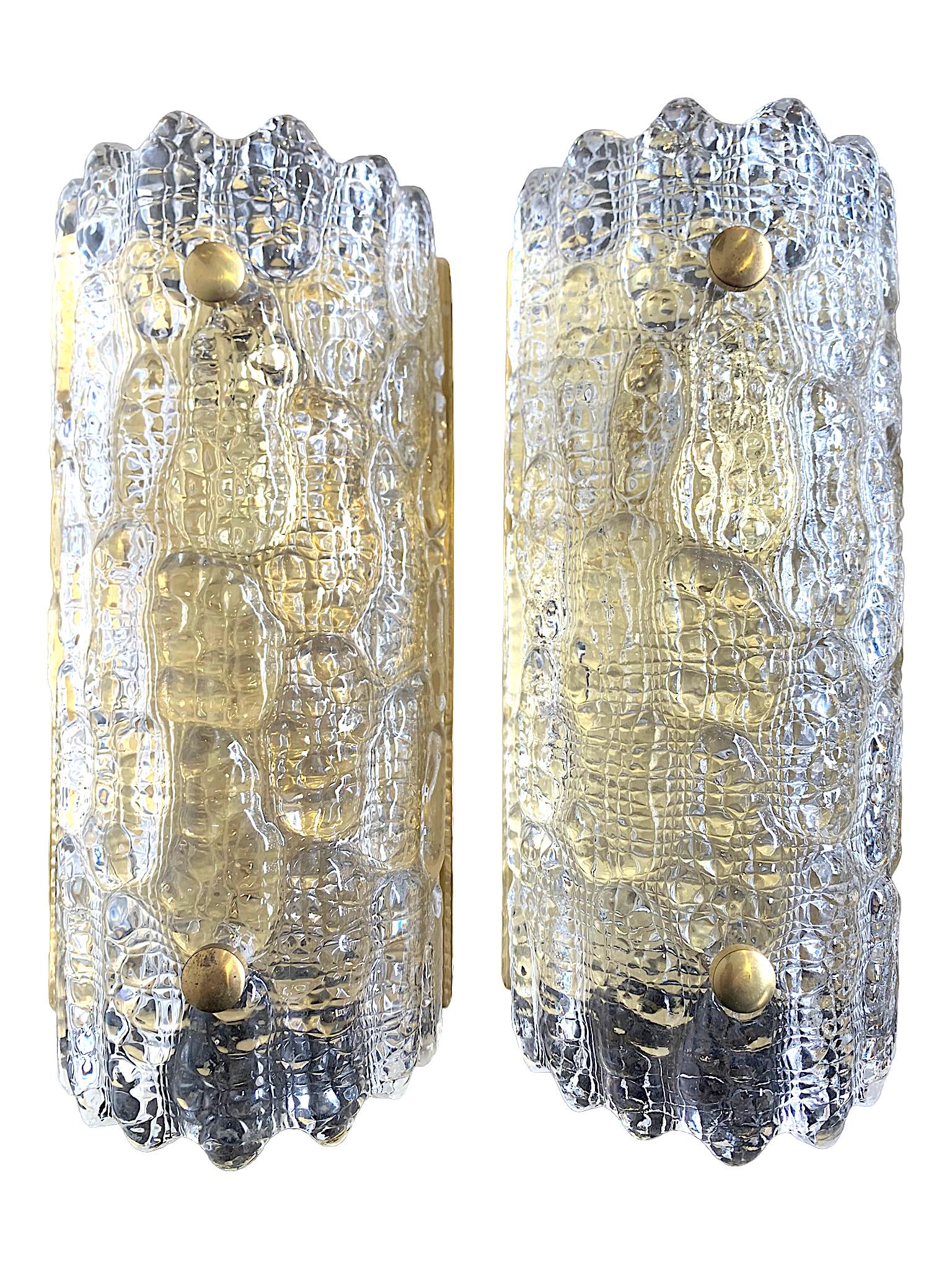 Mid-Century Modern A pair of Orrefors Glass Wall Sconces with Brass Plates by Carl Fagerlund For Sale