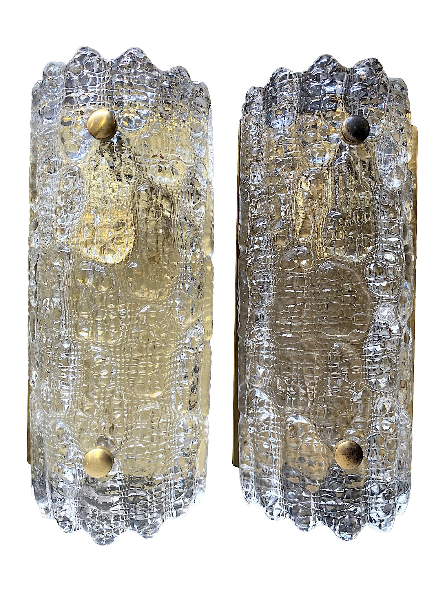 Swedish A pair of Orrefors Glass Wall Sconces with Brass Plates by Carl Fagerlund For Sale