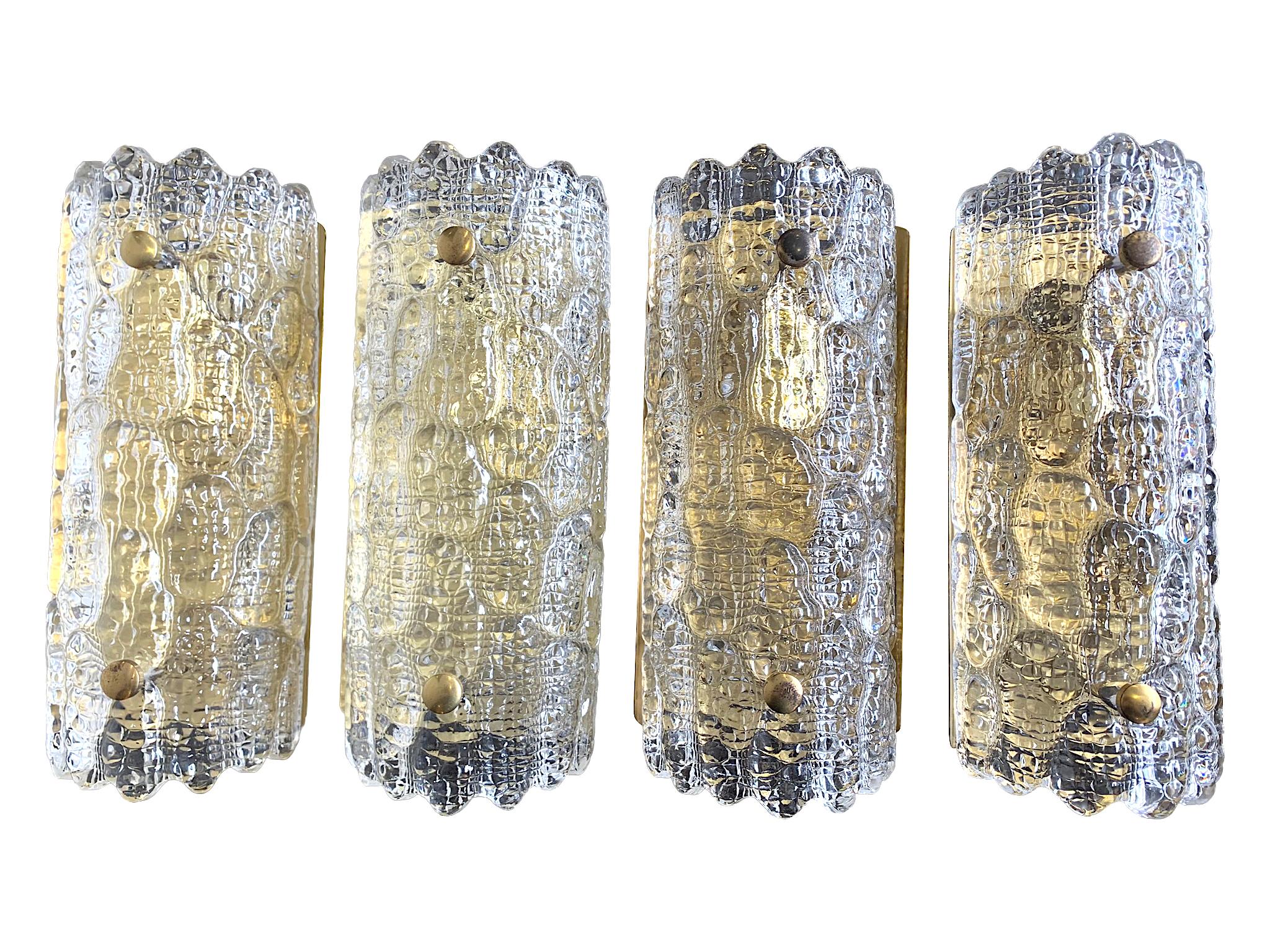 A pair of Orrefors Glass Wall Sconces with Brass Plates by Carl Fagerlund In Good Condition For Sale In London, GB