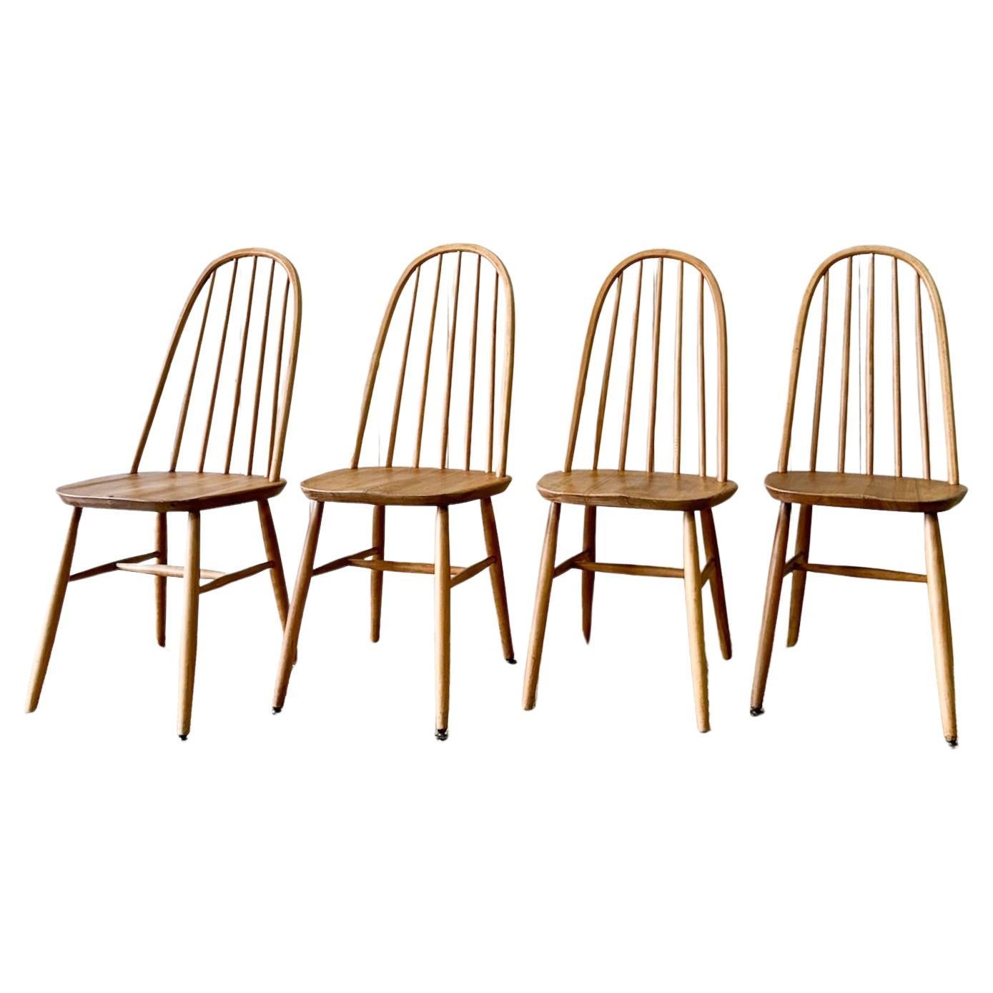 A Set of 4 Pine Ercol Chairs For Sale