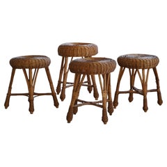 A set of 4 Scandinavian Vintage Stools in Rattan, in Style of Tony Paul, 1960s