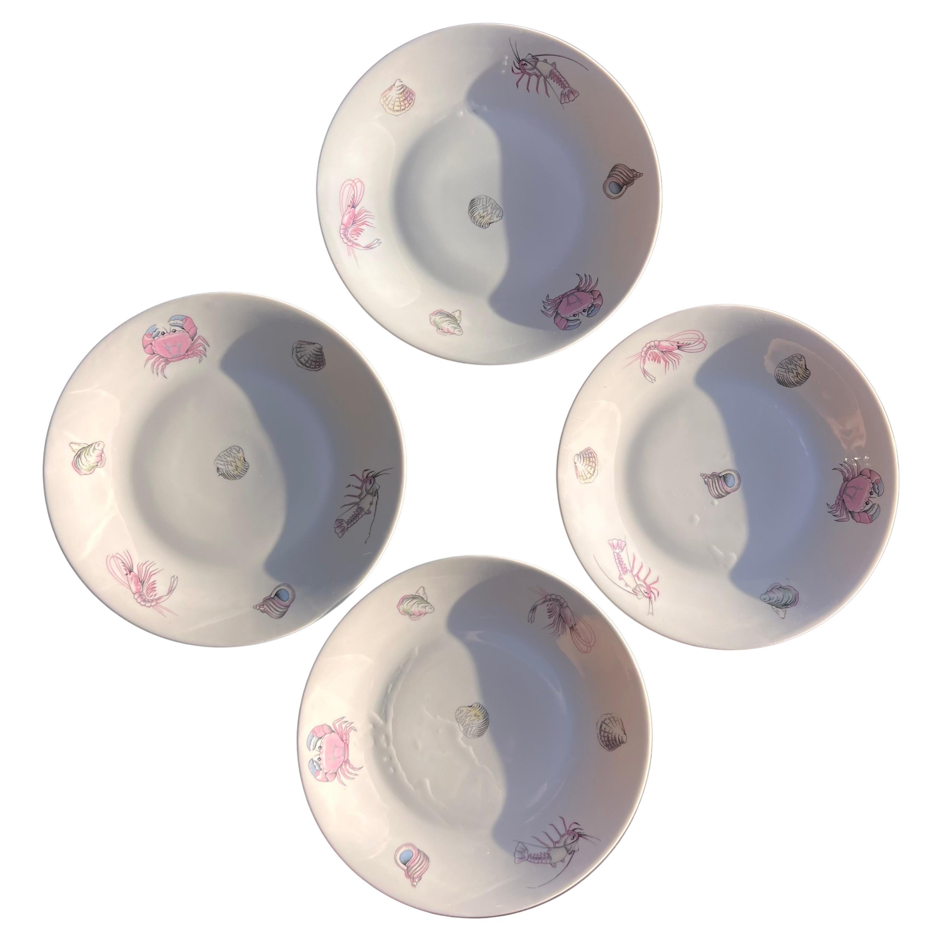 A set of 4 sea-themed French porcelain plates by Apilco, 20th century