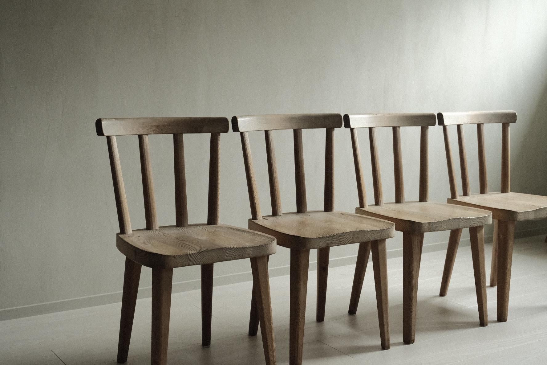 A set of four beautiful Utö chairs by Swedish designer Axel Einar Hjorth, produced by Nordiska Kompaniet in Sweden, 1930s. 



