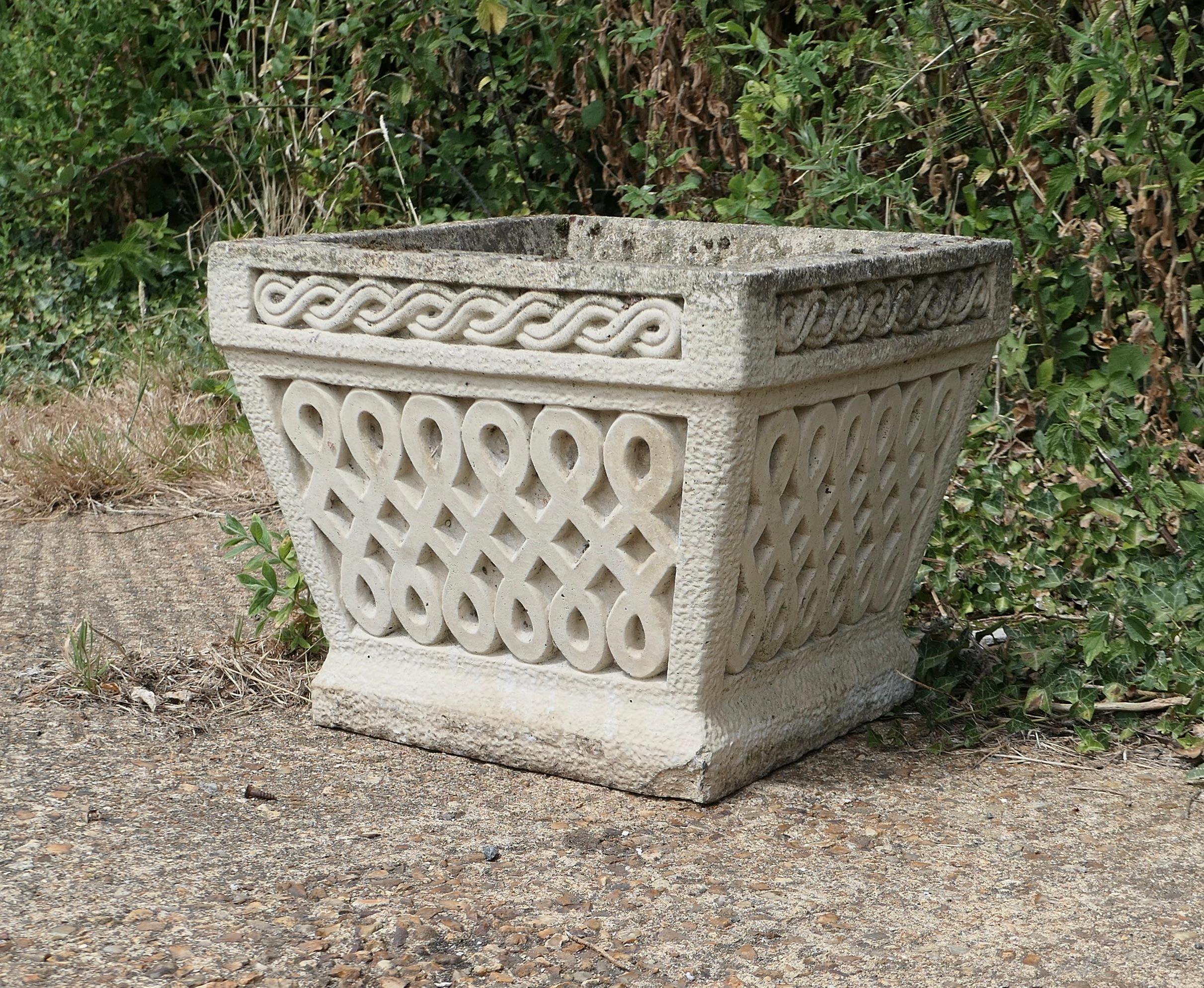 A set of 5 classical basket weave garden planters

An excellent set of 5 large square planters, this superb set came from an outdoor staircase where they were planted and displayed along one side
They are decorated in the Celtic style of the