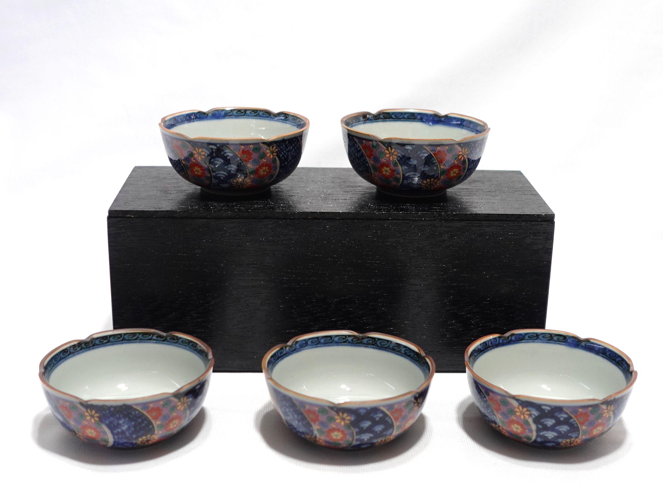 Five in the original box from an old storage and in new condition, footed bowls measure 3.25