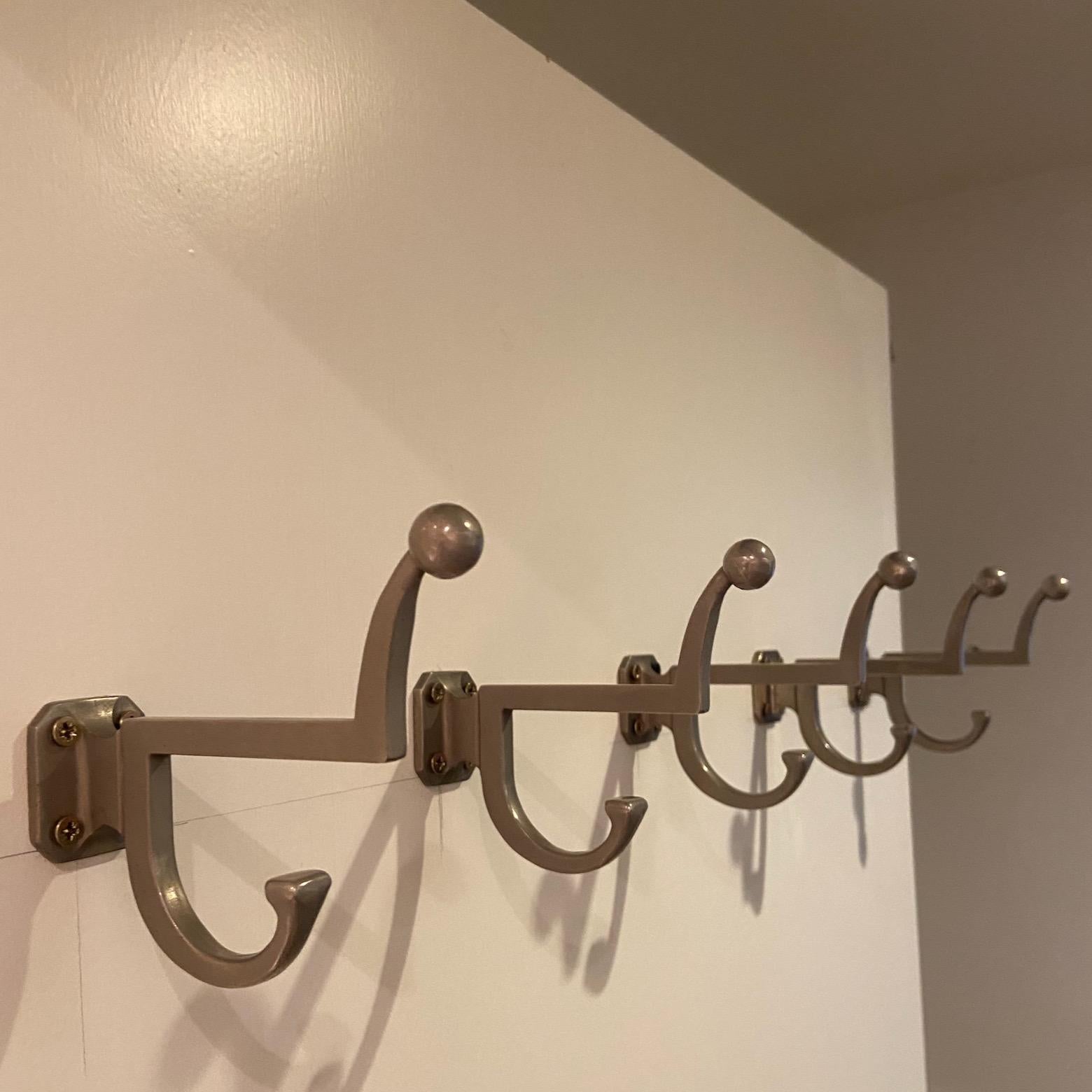 a set of 5 mid-century modernist metal coat hooks or hangers In Good Condition For Sale In London, GB