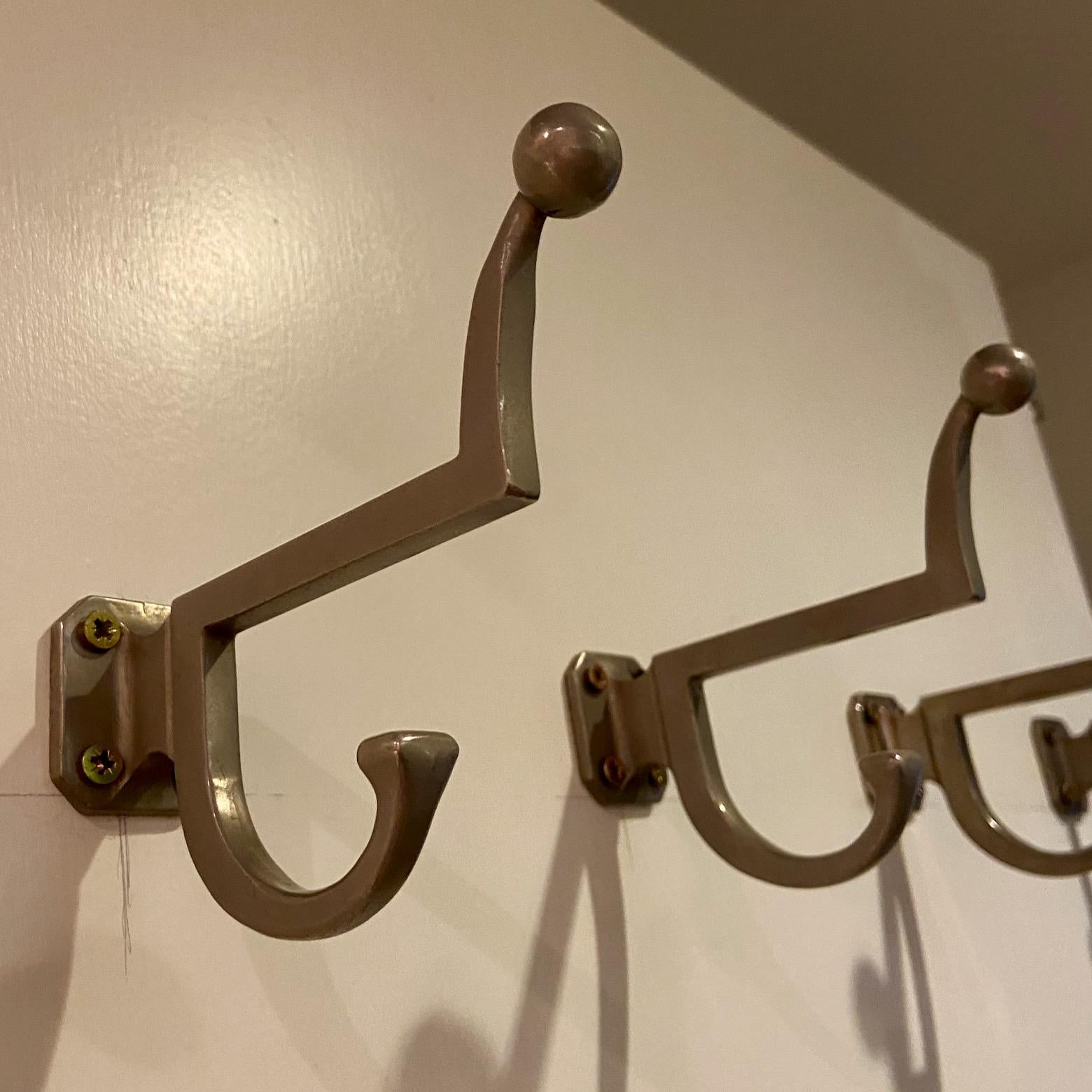 20th Century a set of 5 mid-century modernist metal coat hooks or hangers For Sale