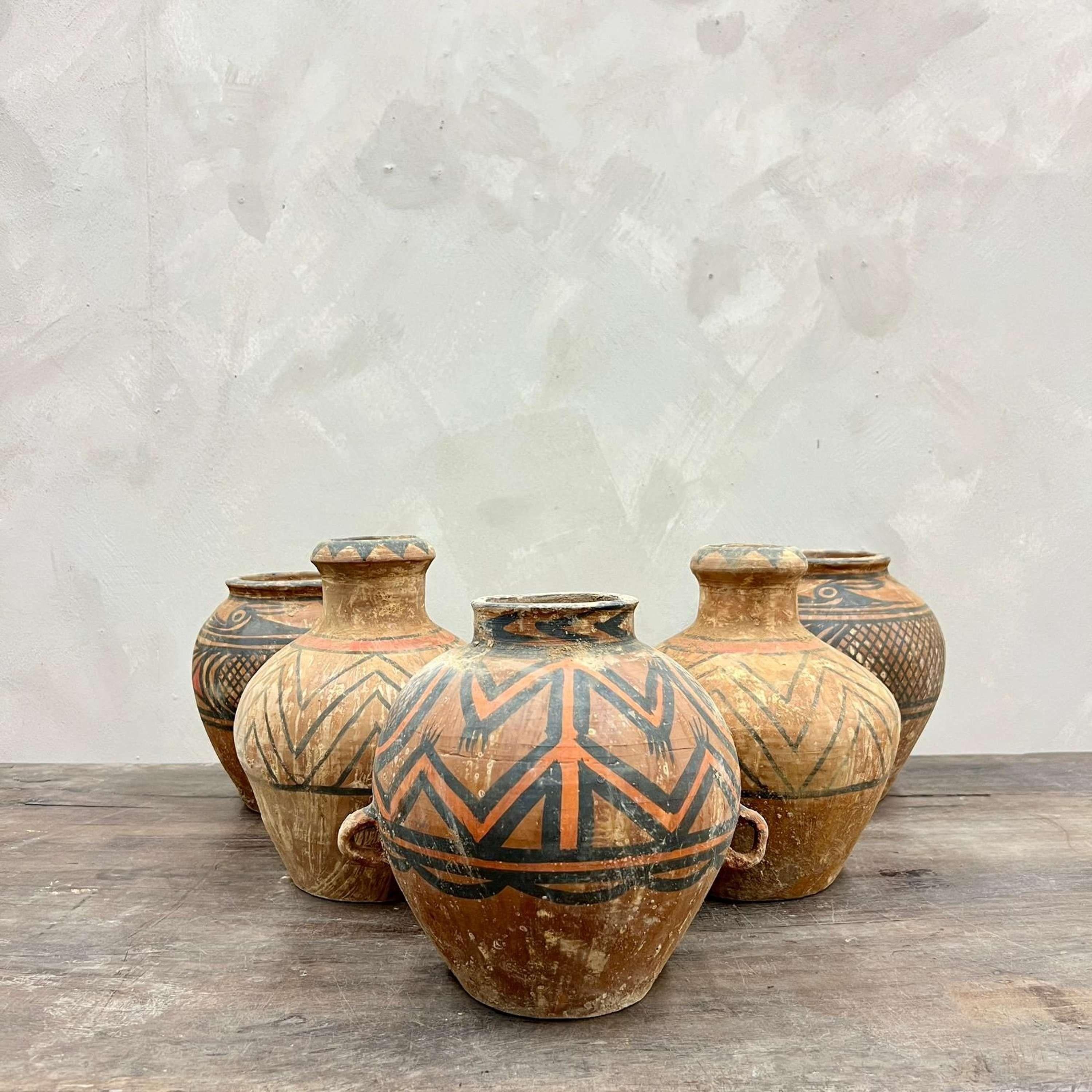 A wonderful set of five Neolithic Clay Pottery Vessels, with hand painted decoration in orange, red and black paint.

1.
Height - 27.5 cm
Width - 20 cm
2.
Height -27.5 cm
Width - 20 cm
3.
Height - 23 cm
Width - 24 cm
4.
Height - 24 cm
Width - 22