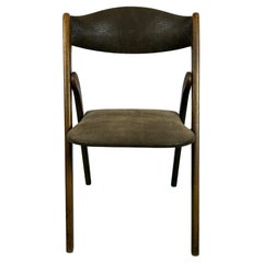 A Set of 5 Walnut Folding Chairs by Coronet Norquist