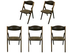 A Set of 5  Walnut Folding Chairs by Coronet Norquist