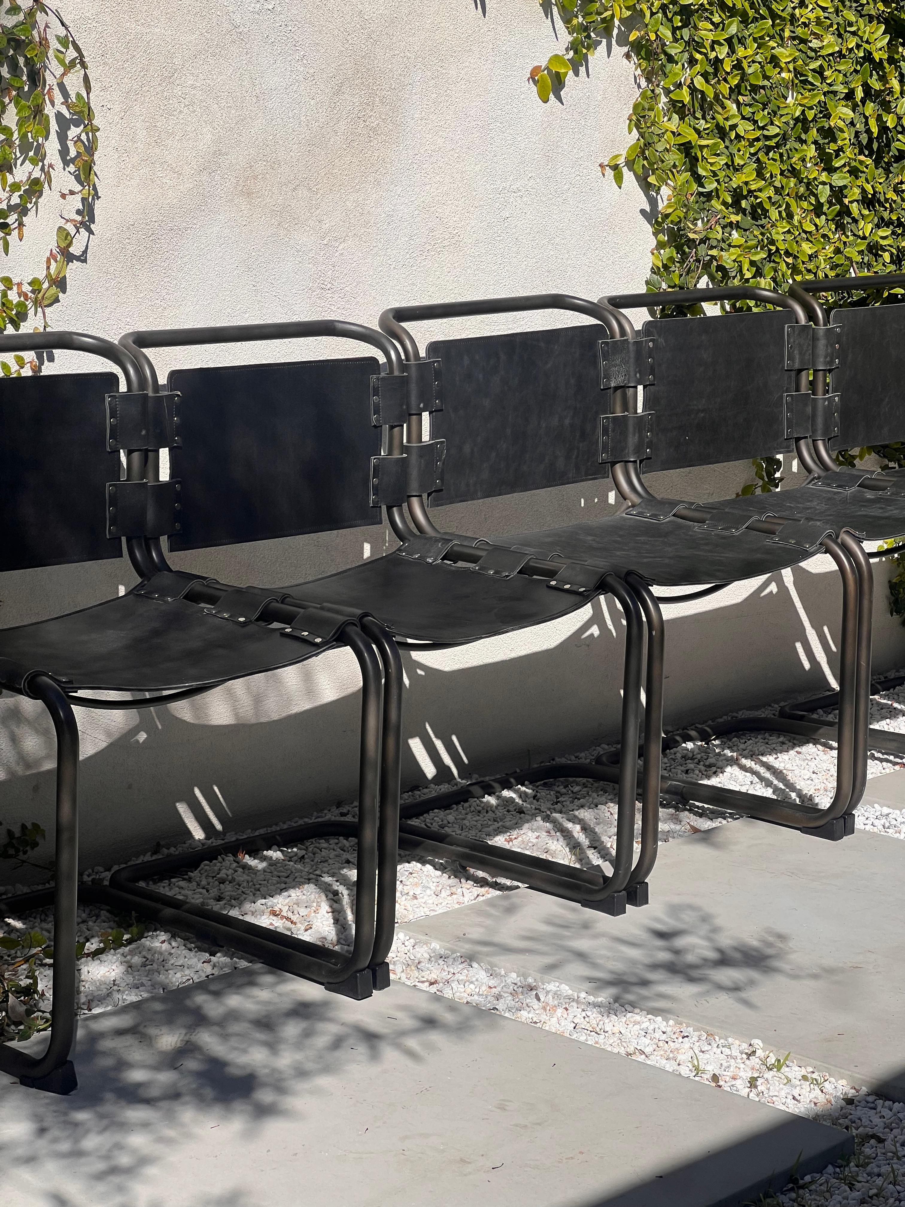 A set of 6 cantilever leather and metal chrome dining chairs, 20th century 6