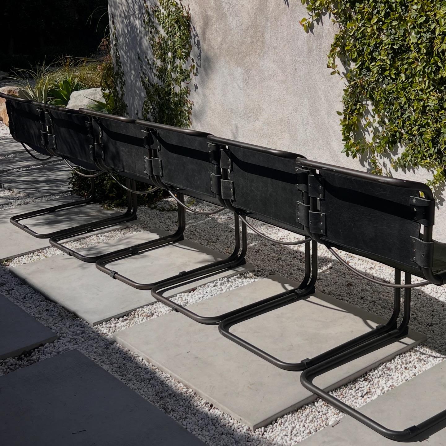 Unknown A set of 6 cantilever leather and metal chrome dining chairs, 20th century