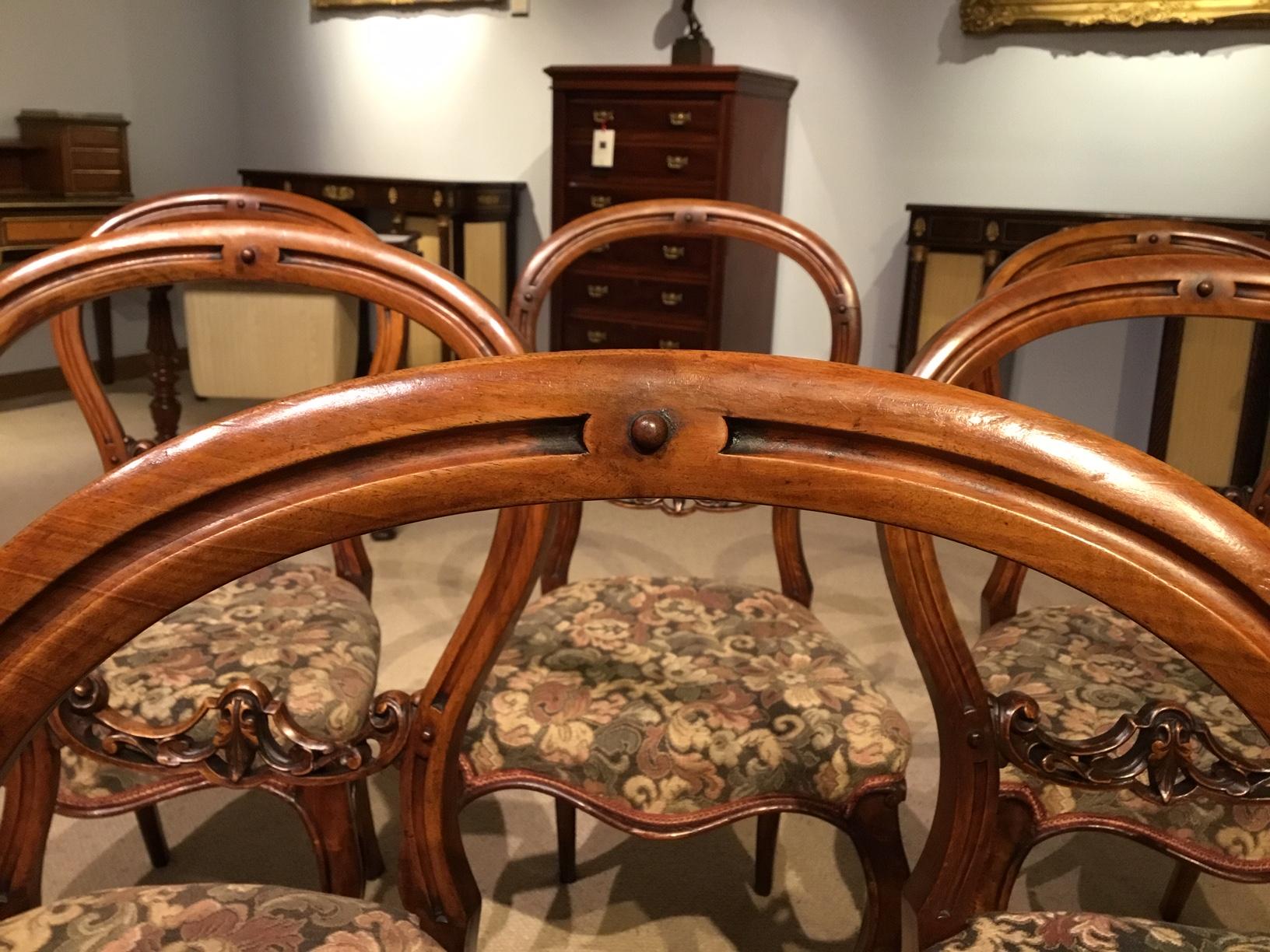 A good set of six English walnut Victorian Period cabriole leg antique dining chairs. The 