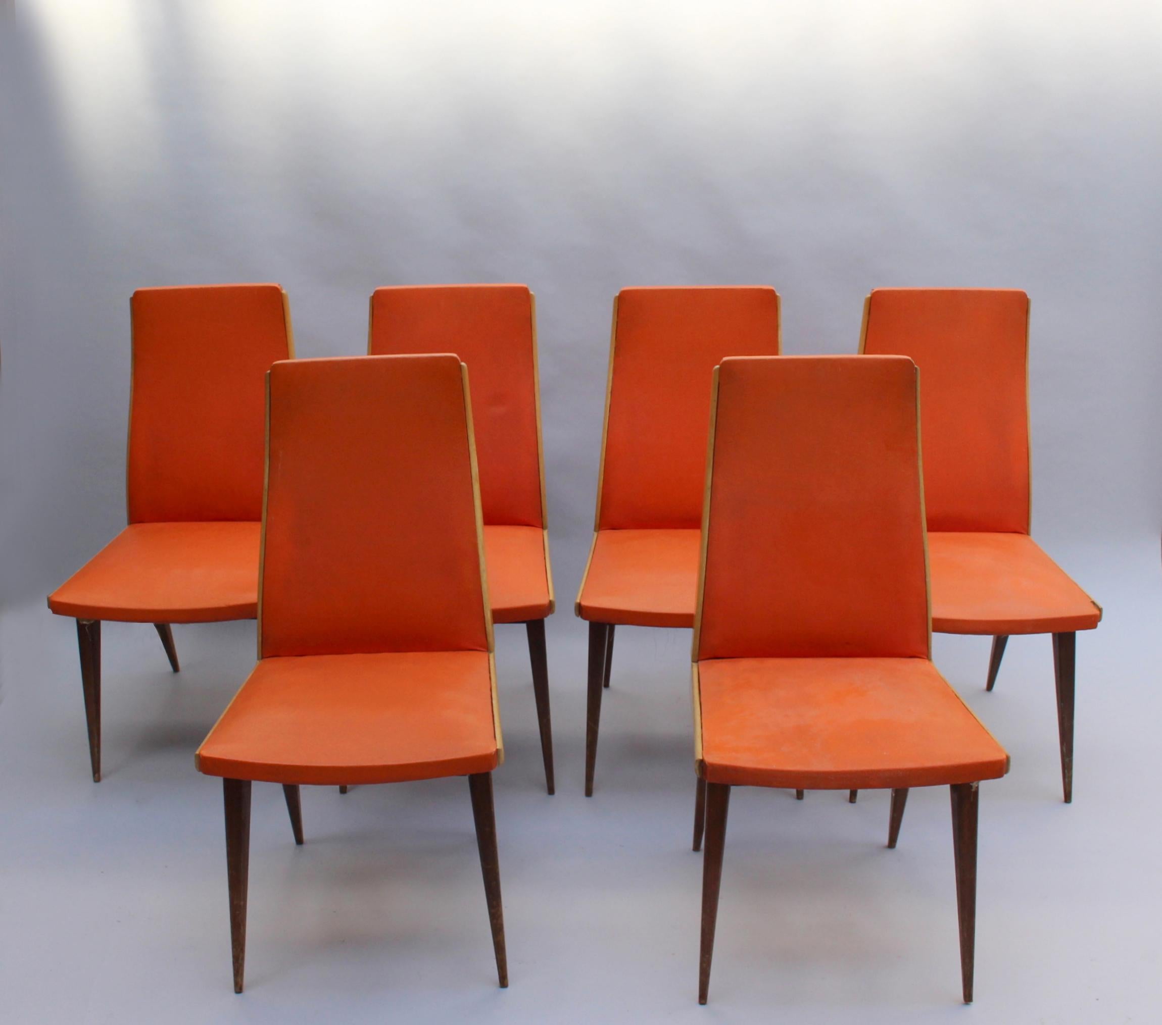 A set of 6 midcentury compass style beech chairs.