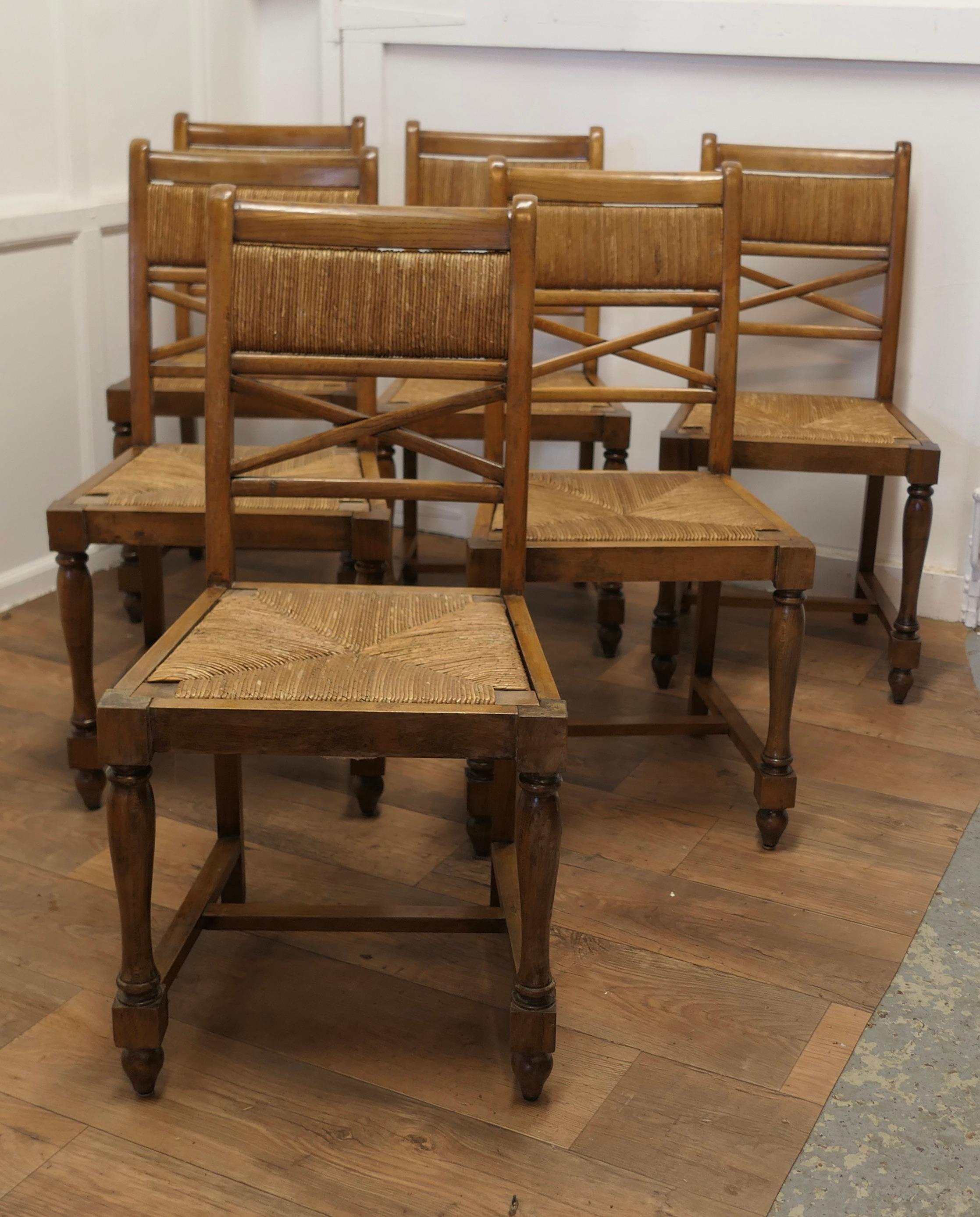 A Set of 6 French Golden Oak Country Dining Chairs 

This is a very attractive set of Golden Oak chairs, 6 in all
The chairs are a classic design and made from solid Oak and in a good colour
The chairs  are roomy and comfortable and the backs and