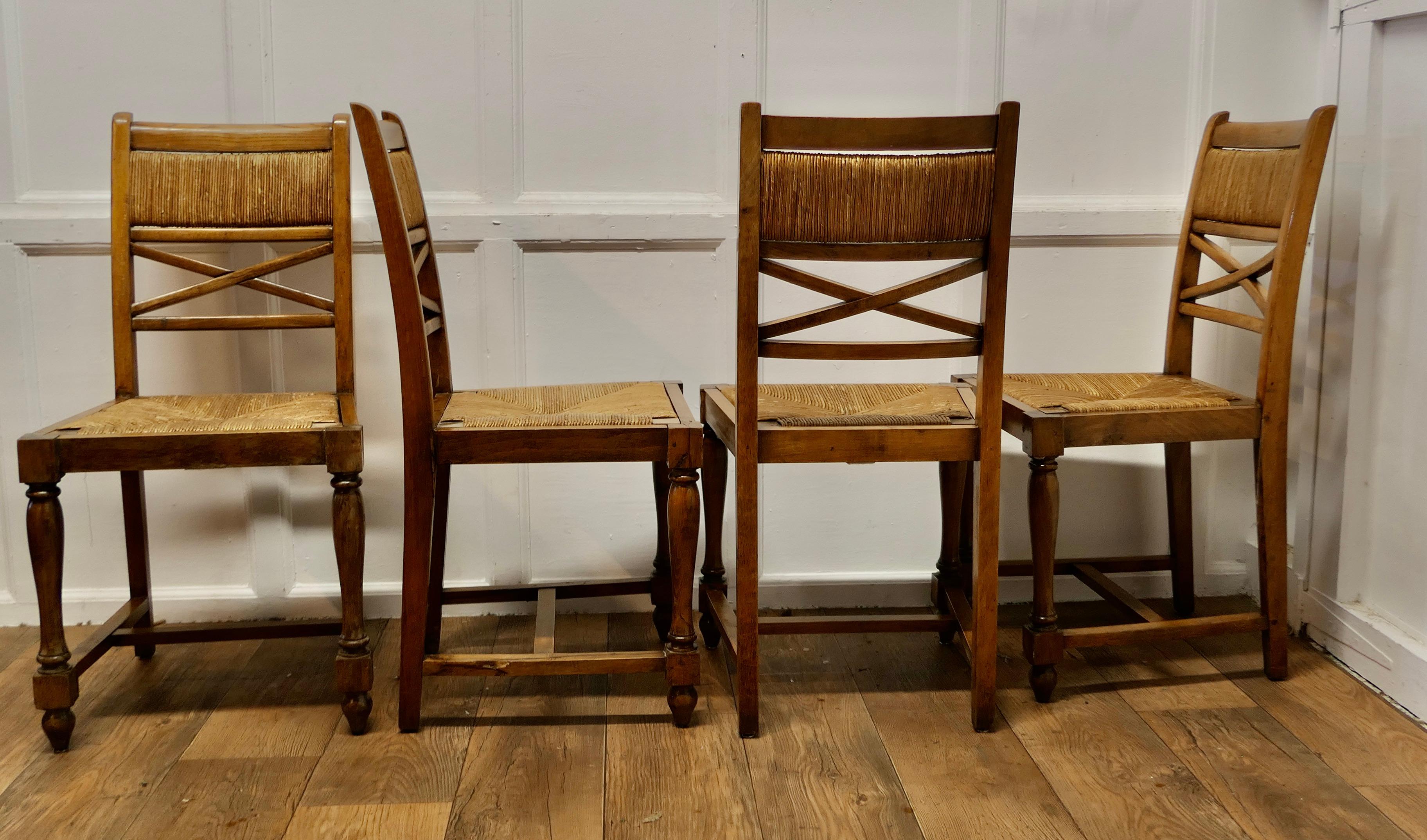 Early 20th Century A Set of 6 French Golden Oak Country Dining Chairs     For Sale