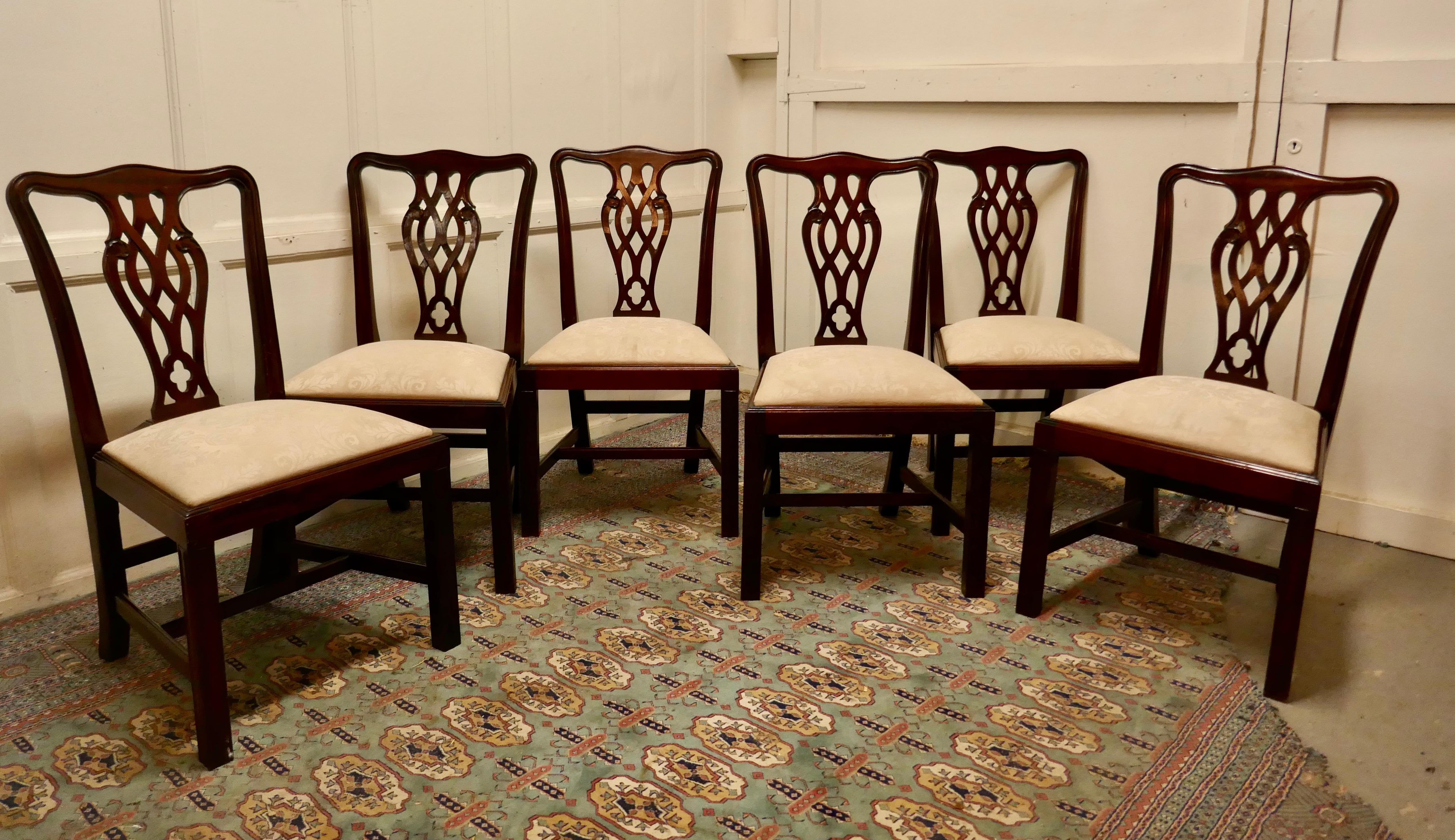 A Set of 6 Good Quality Chippendale Style Dining Chairs 

The chairs are a classic Georgian design they have a pierced Back Splat and are roomy and comfortable, the seats are the ‘drop in’ type and have cream brocade upholstery, they are used but