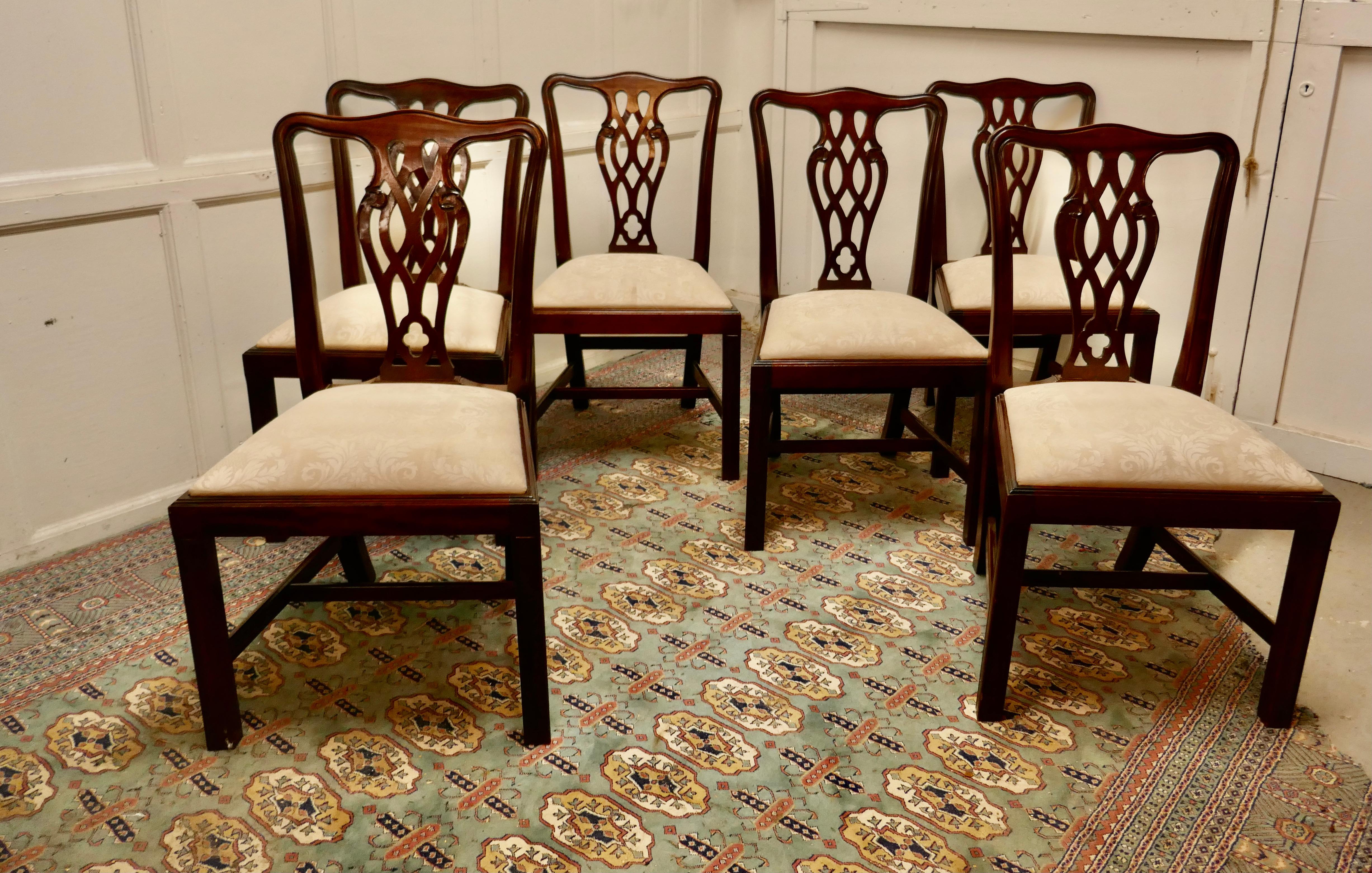 A set of 6 good quality Chippendale style Mahogany dining chairs 

The chairs are a classic Georgian design and made in Mahogany they have a pierced Back Splat and are roomy and comfortable, the seats are the ‘drop in’ type and have cream brocade