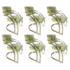 A set of 6 green velvet gold waterfall cantilever brass plated dining chairs