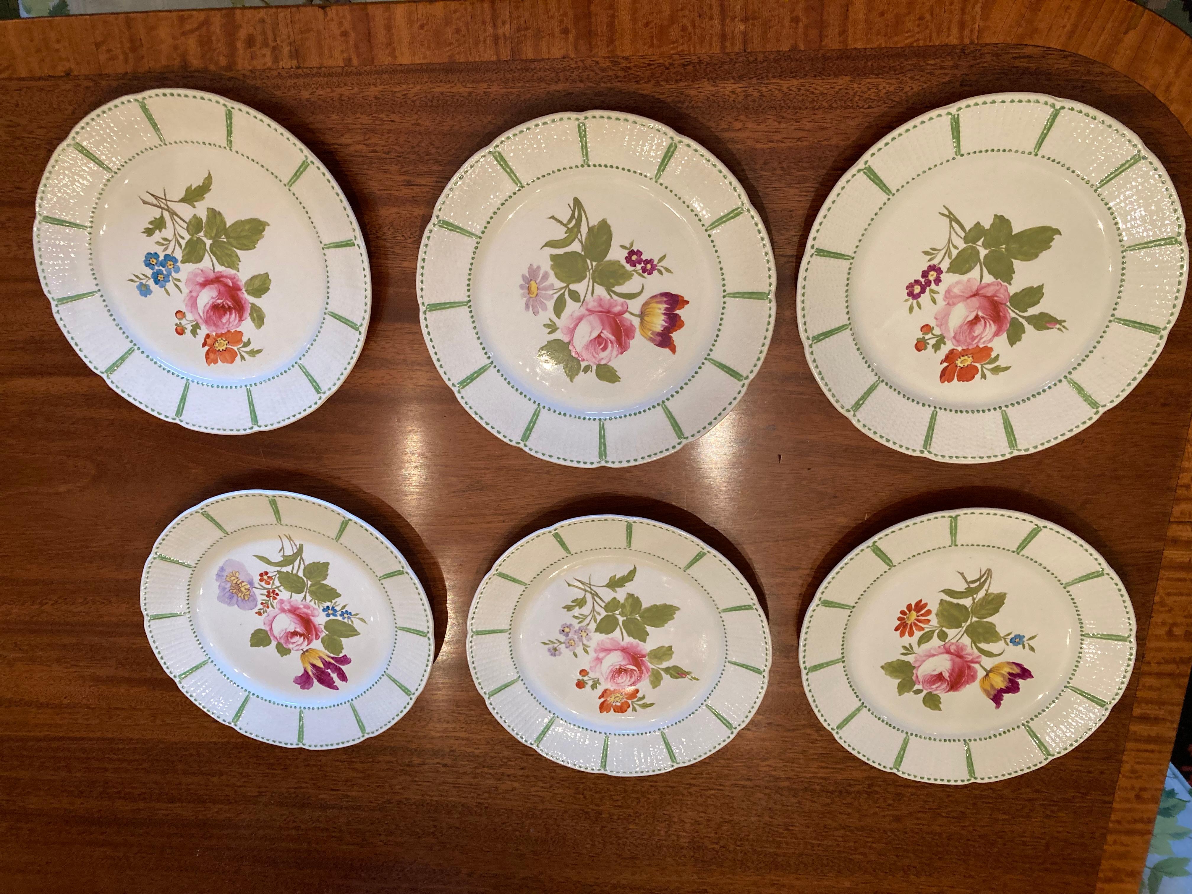 A set of 6 impressed mark Wedgwood botanical plates- 19th century with diaper borders all hand painted.