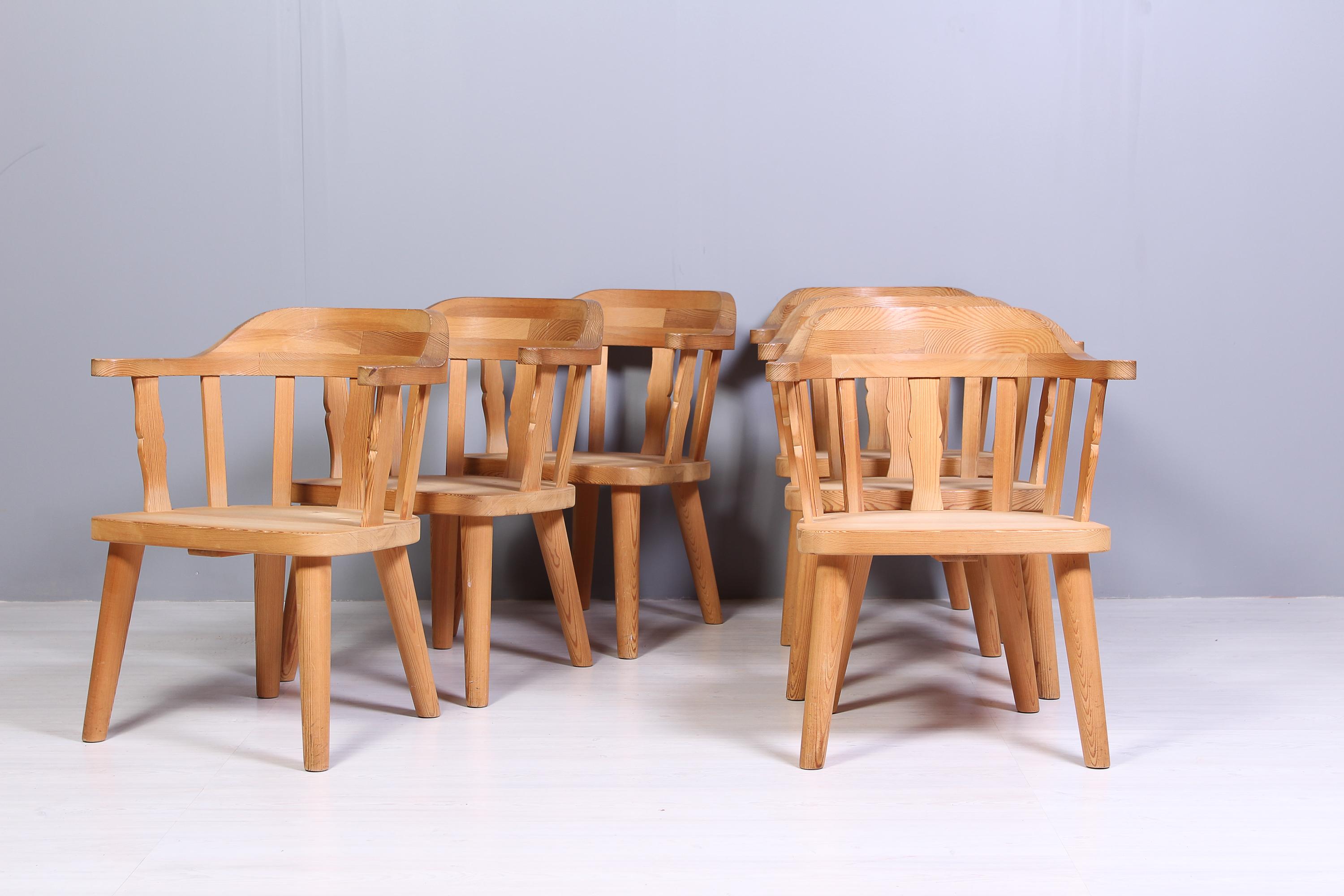 A set of six pine armchairs by the Norwegian manufacturer Krogenäs. Made in second half of the 20th century. All six chairs are made out of solid pine and are in very good vintage condition with signs of usage consistent with age. Very stabile and