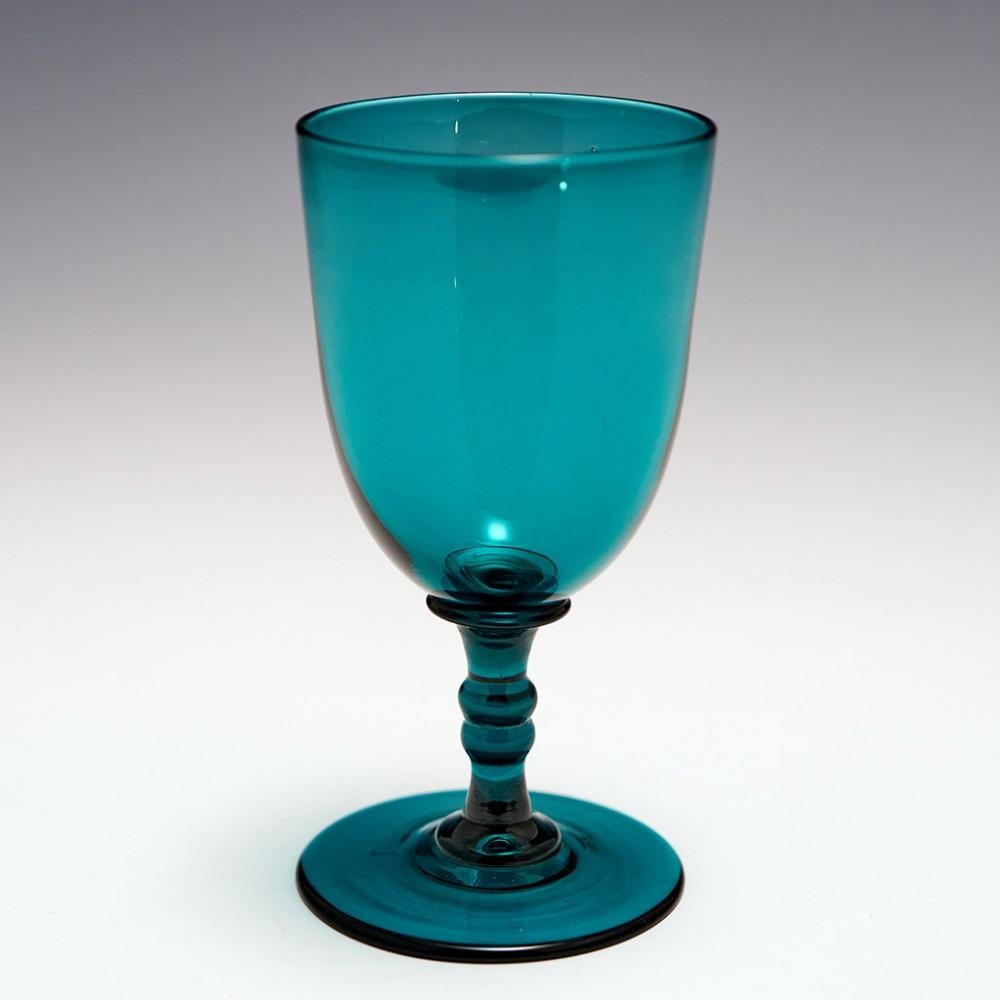 A Set of 6 Victorian Peacock Blue Wine Glasses, c1855

Additional information: 
Period : Victoria 1840-1870
Origin : England 
Colour : Peacock blue
Bowl : Round funnel
Stem : Blade knop collar above a plain stem and small cushion with two medial