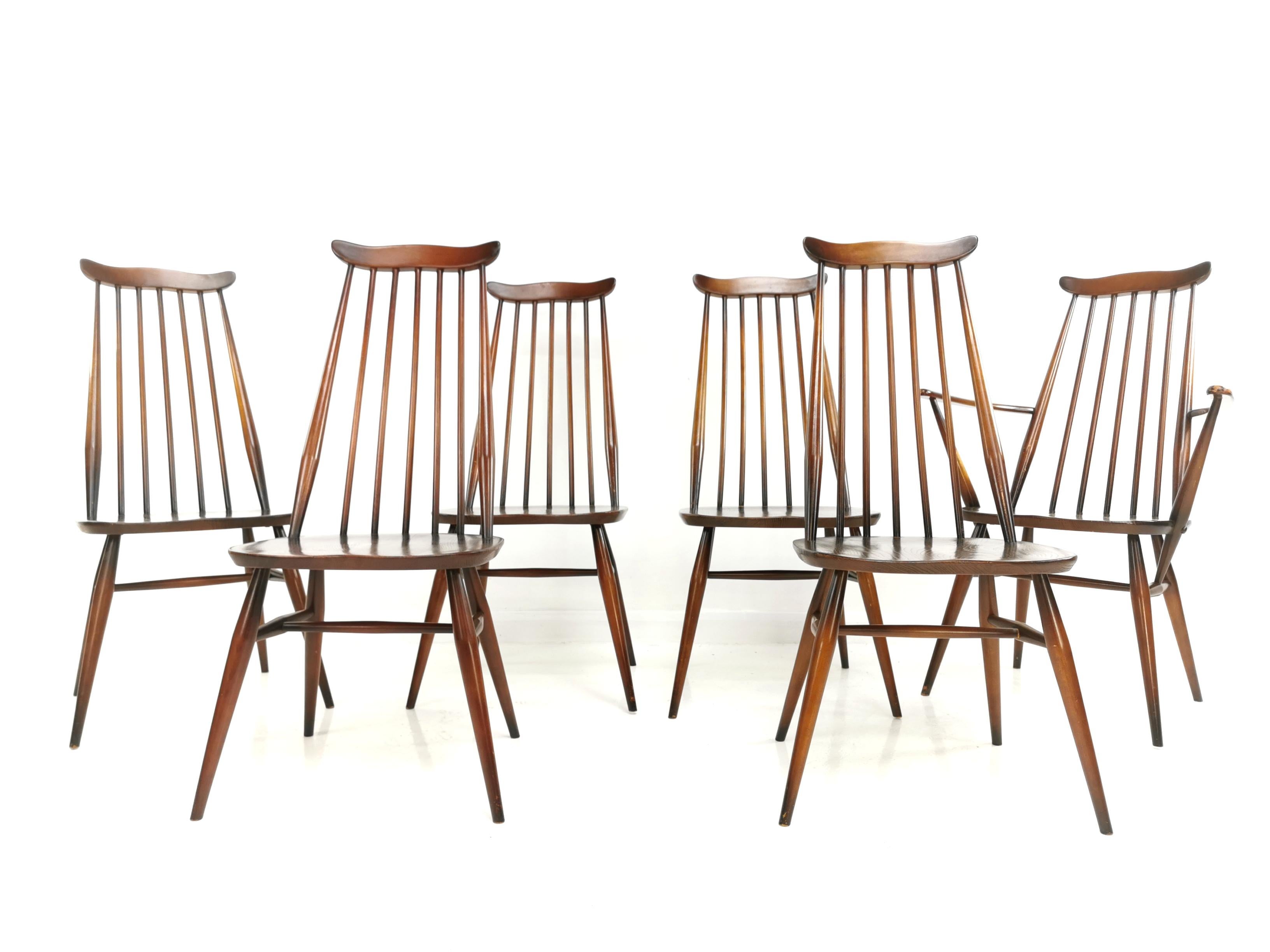 Six Ercol Goldsmith dining chairs. 

A set of six high back Goldsmiths chairs including a carver. 

Designed by Lucian Ercolani. High quality chairs and made with Elm and Beechwood. 

Dimensions (cm): 42 W x 52 D x 96 H - Seat height
