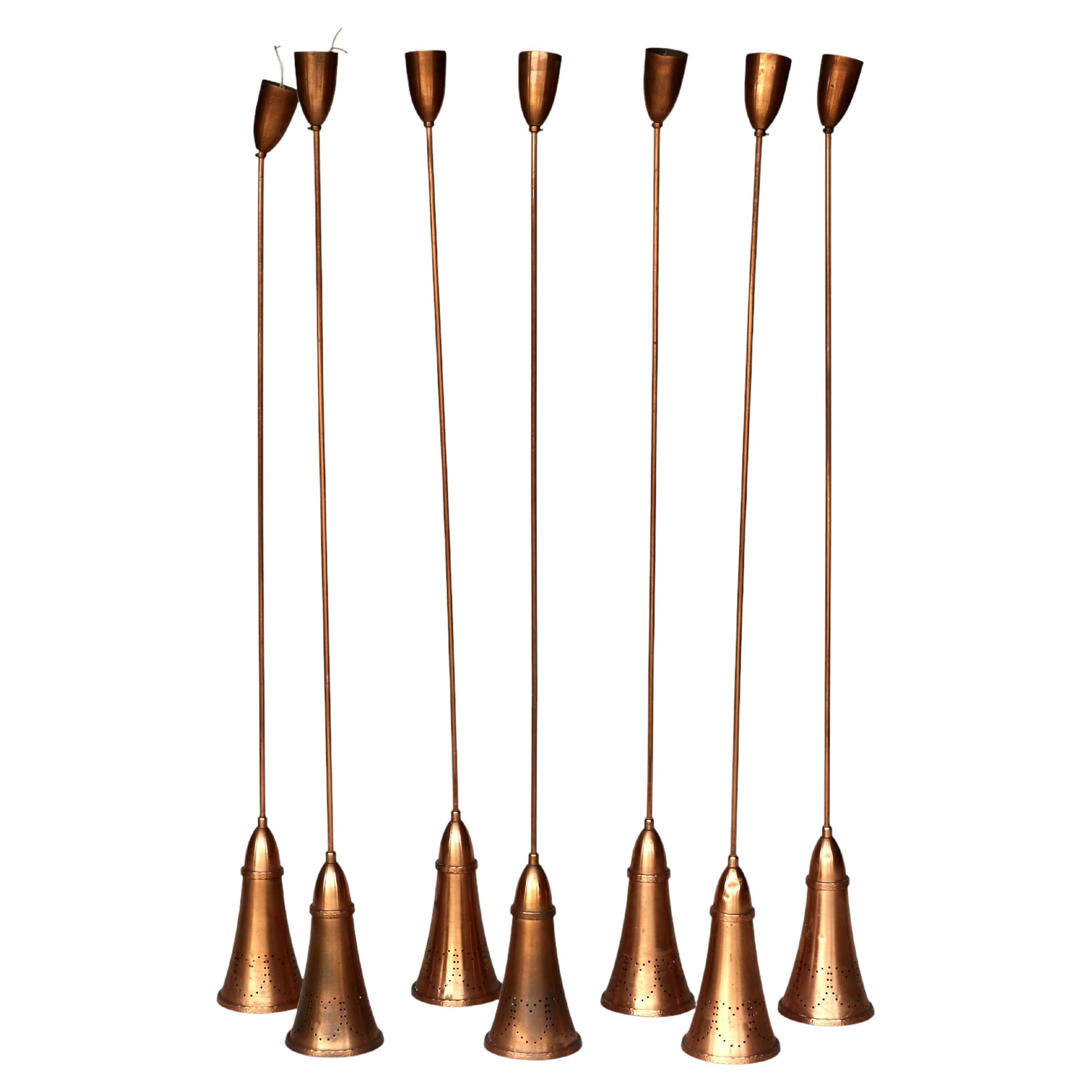 Un ensemble de 7 lampes suspendues. France, années 60. en vente