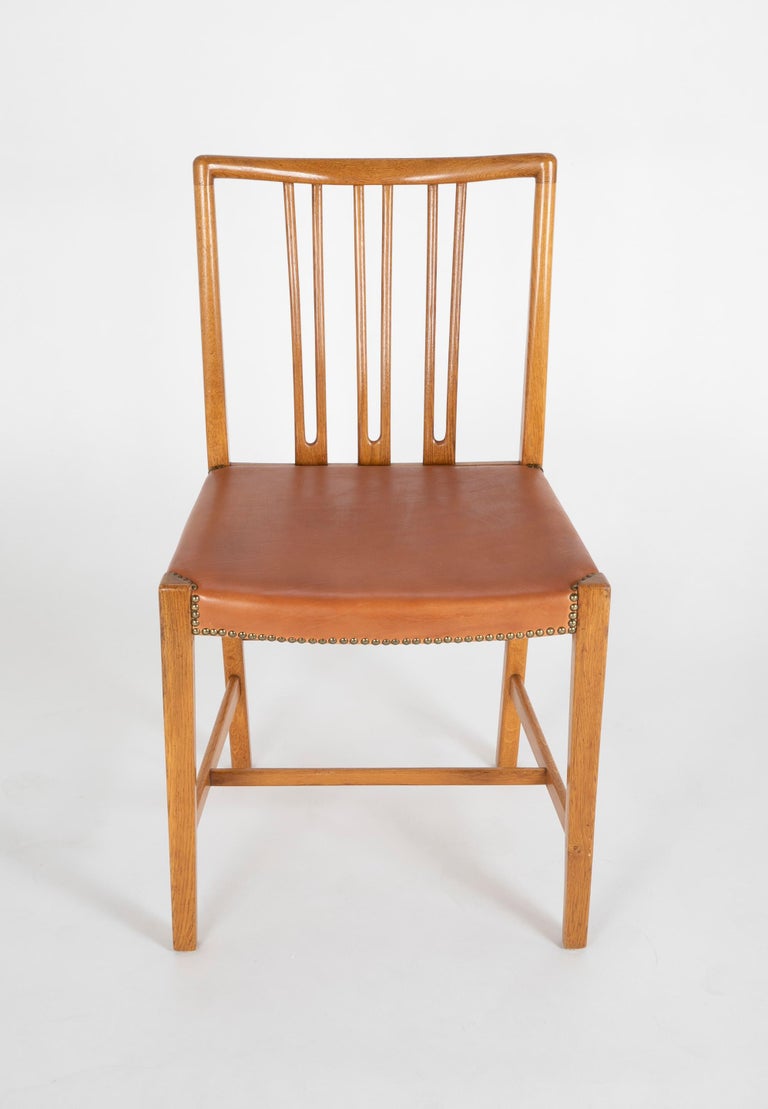 Set of 8 Dining Chairs with Leather Seats by Hans Wegner and Mikael