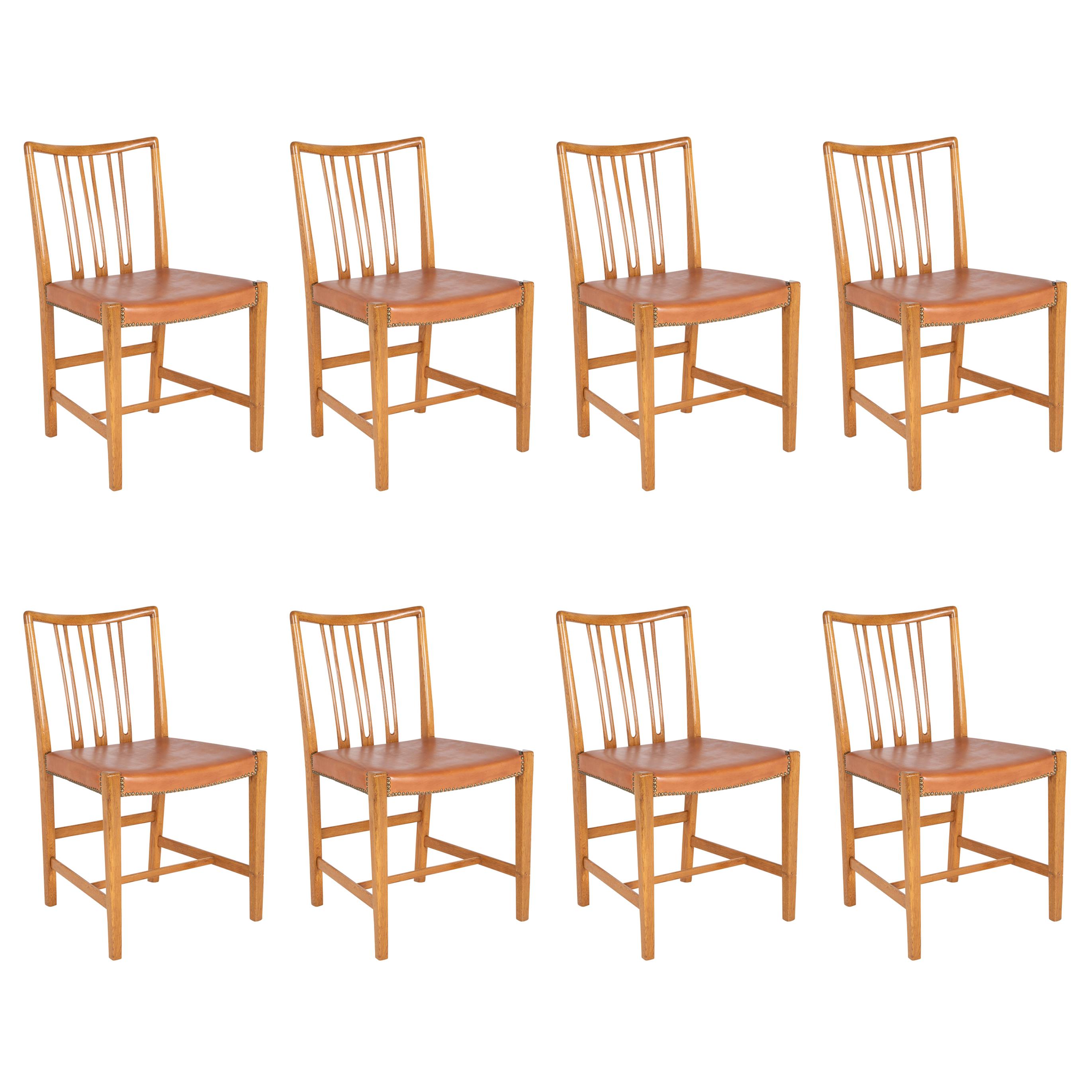 Set of 8 Dining Chairs with Leather Seats by Hans Wegner & Mikael Laursen