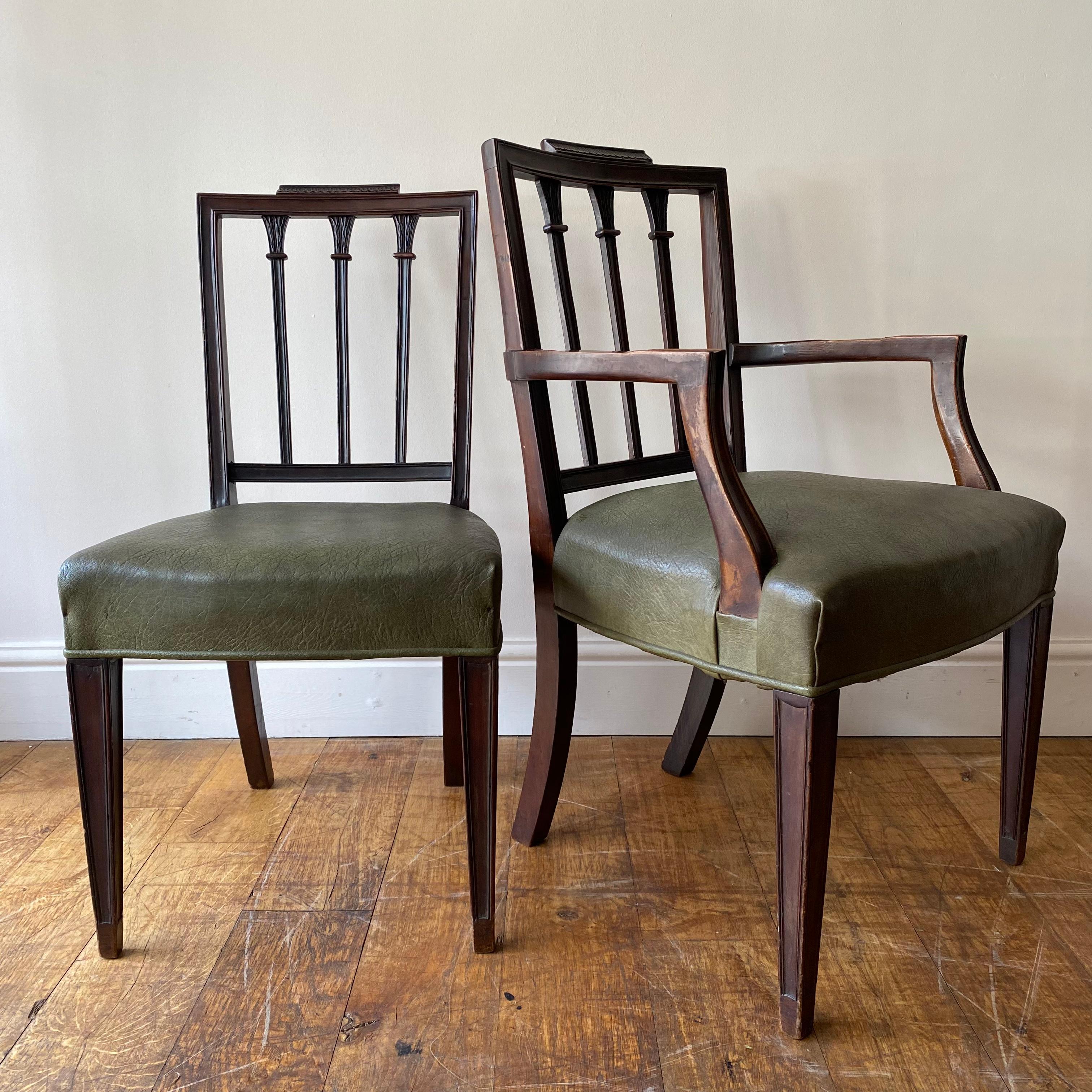 A set of 8 Sheraton period dining chairs consisting 6 side chairs and 2 carvers with later green leather upholstery.

Very heavy, substantial chairs of excellent quality. 

English, circa 1810.

Seat height: 47cm.

Other measurements were