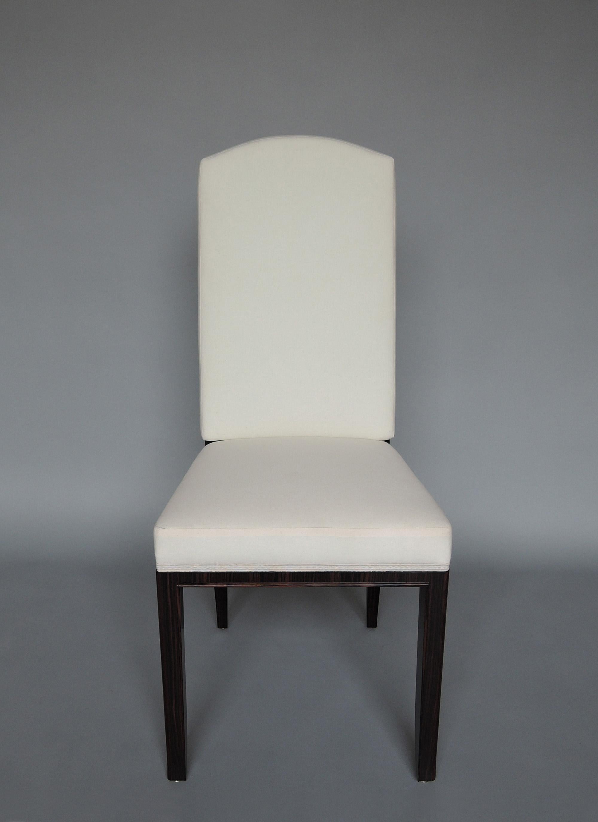 Paul Frechet (1875-1973)
A set of eight fine French Art Deco Macassar ebony (veneer and solid) side chairs with a refine trim along the side and front legs.
