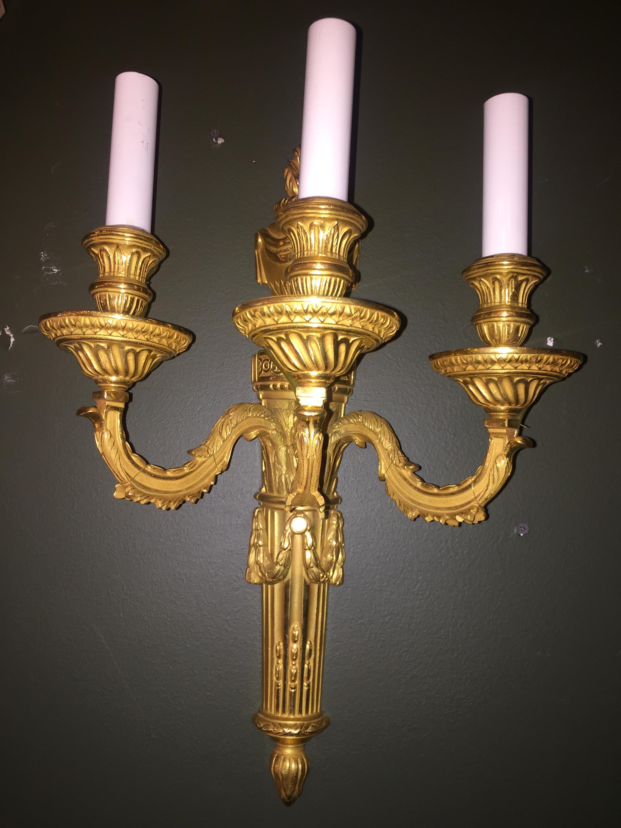 Set of 8 Louis XVI Style Gilt Bronze Three-Arm Wall Sconces In Good Condition In New York, NY