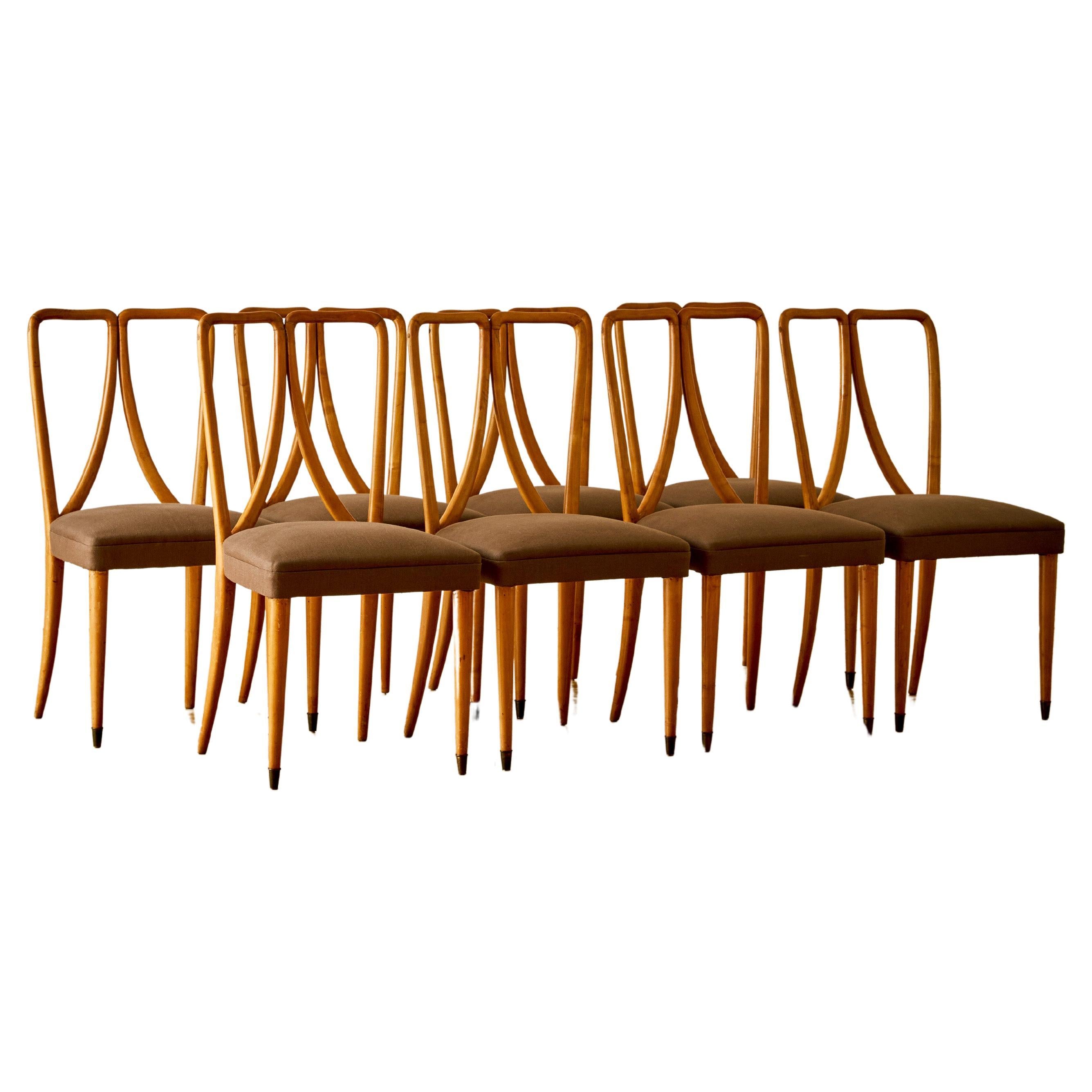  A set of 8 fruitwood dining chairs by Guglielmo Ulrich For Sale