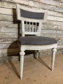 A set of 8 Gustavian dining room chairs