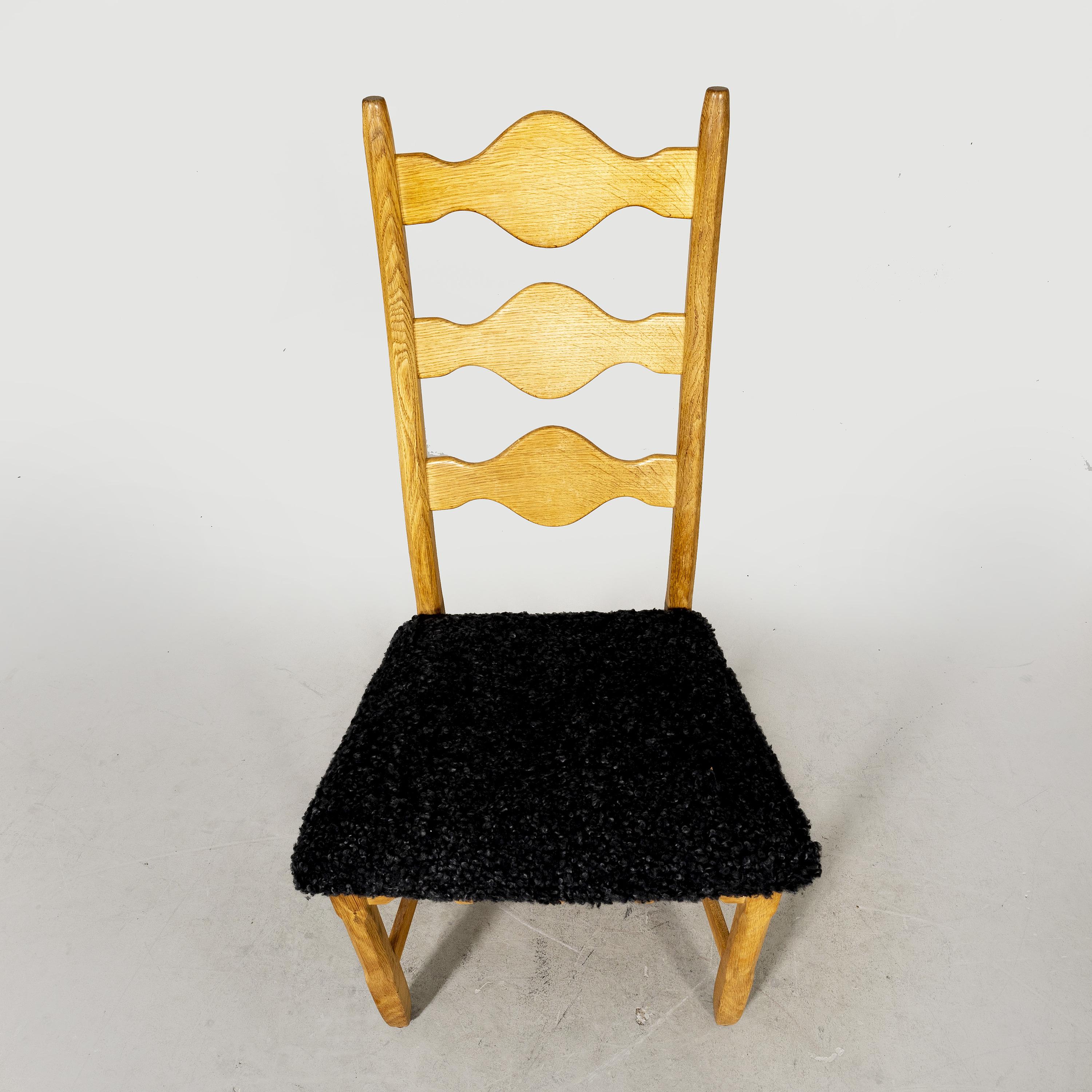 A set of 8 dining chairs was designed by Henning (Henry) Kjærnulf in the 1960s. The chairs were produced by Nyrup Møbelfabrik in Denmark and form a rare variant on Kjærnulf 'Razorblade' series The set consists of 8 chairs made of solid oak. The