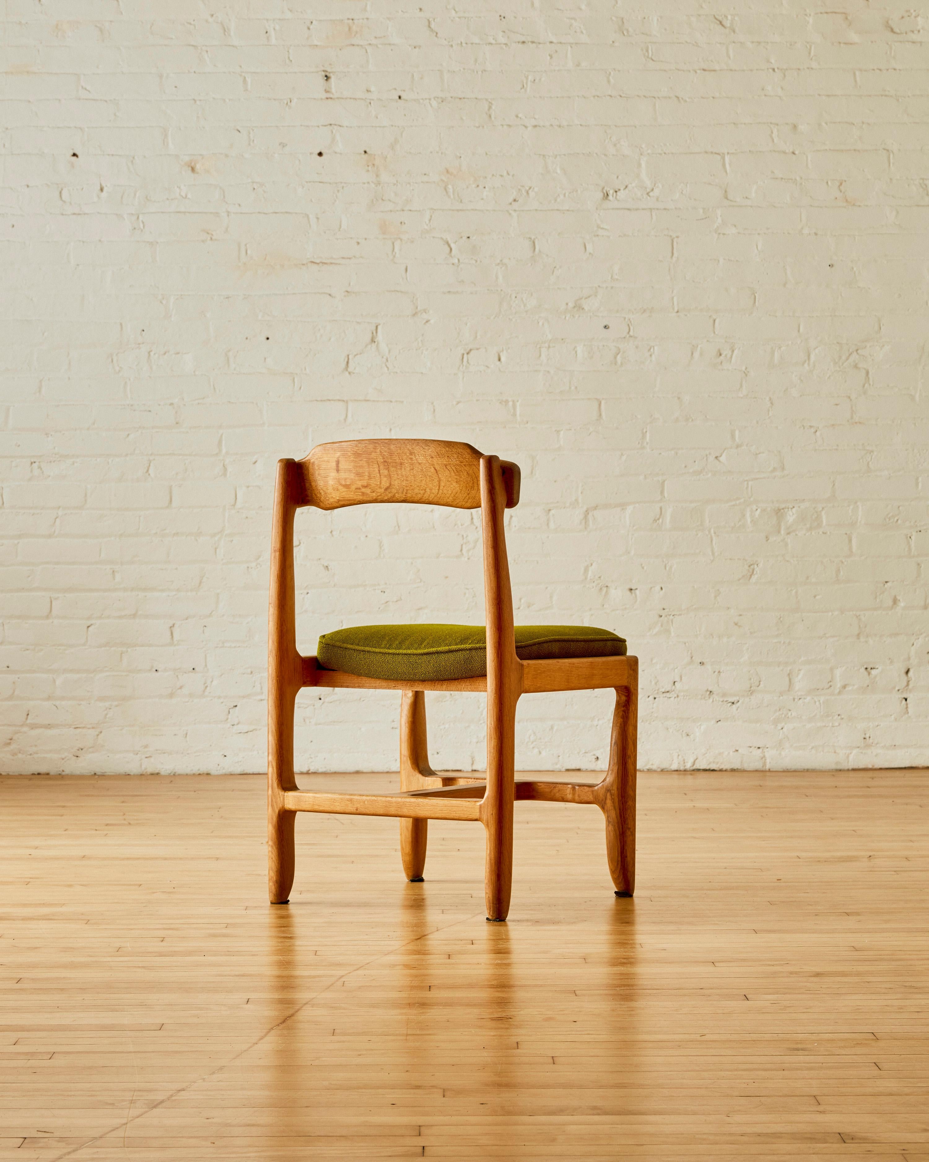 A set of 8 oak Guillerme & Chambron dining chairs 1