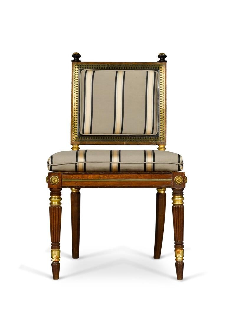 A set of 8 chairs, 4 original by George Bullock and 4 later copies to match, 
Brass-mounted and inlaid ebony and oak with drop-in squab cushions to backrests and loose cushions to cane seats.
Provenance: Don Pedro de Souza e Holstein, 1st Duke of