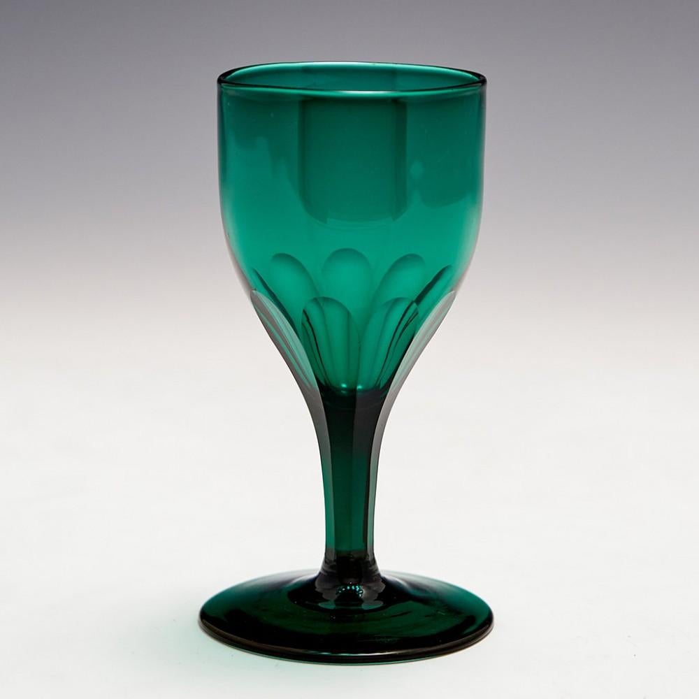A Set of 8 Slice Cut Green Wine Glasses, 1825-50

Additional information: 
Period : 1825-50
Origin : England 
Colour : Green
Bowl : Round funnel, slice cut 
Stem : Slice cut
Foot :Conical
Pontil : Elliptically polished
Glass Type : Lead 
Size : H