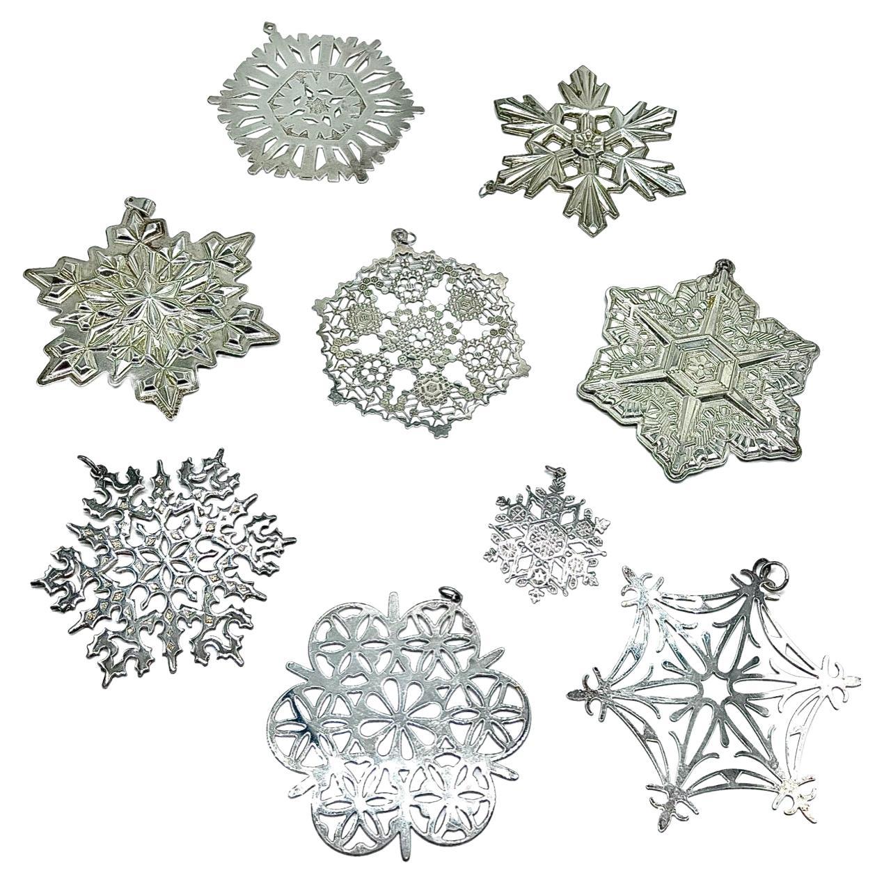 Set of 9 American Sterling Silver Christmas Snowflake Ornaments For Sale