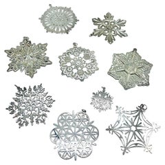 Set of 9 American Sterling Silver Christmas Snowflake Ornaments
