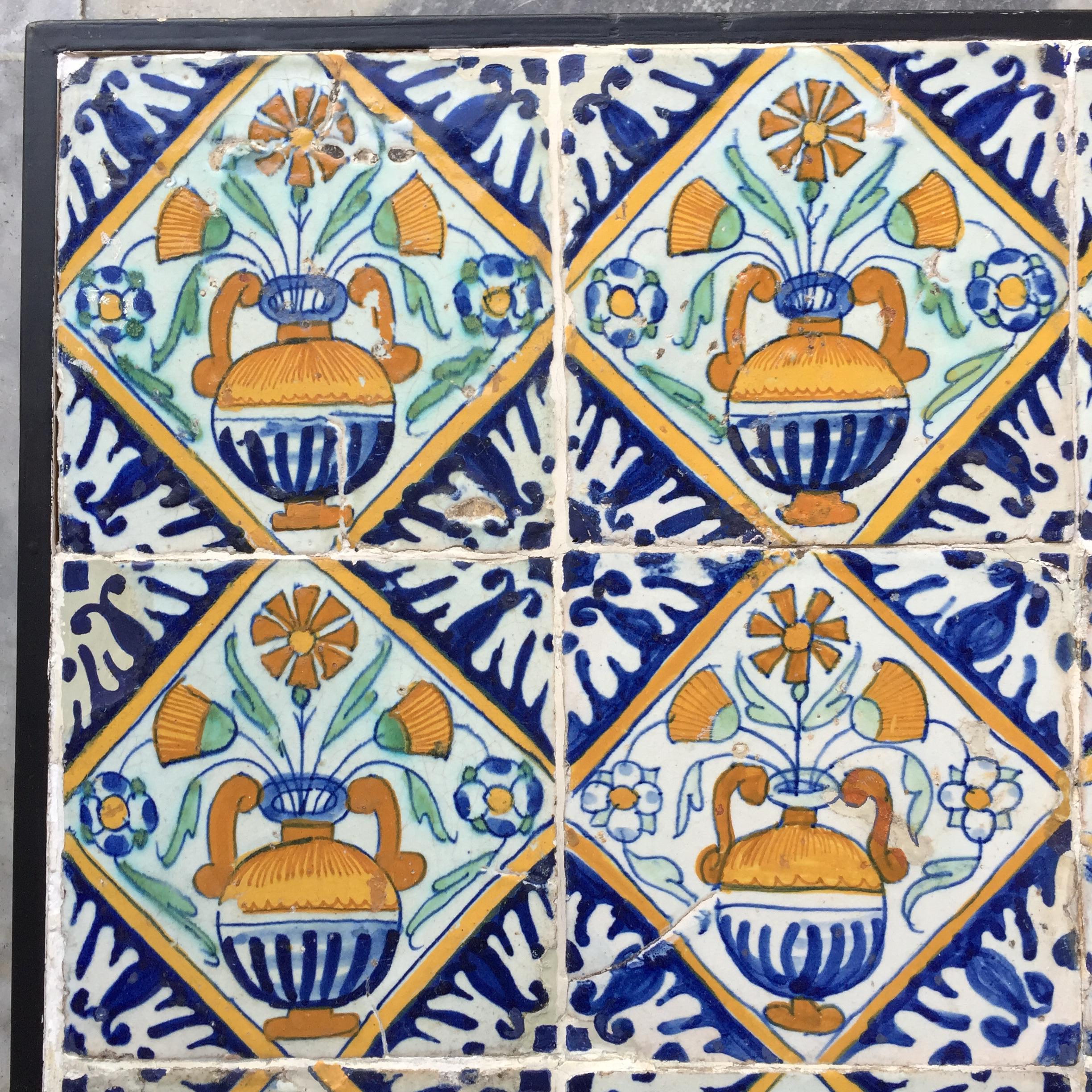 A set of 9 polychrome Dutch Delft tiles with flower vases. 
Made in The Netherlands.
Circa 1600 - 1620.

A wonderful set of 9 tiles with flower vases painted in a quadrant or diamond.
Early polychrome Dutch tiles, on which we can still see some