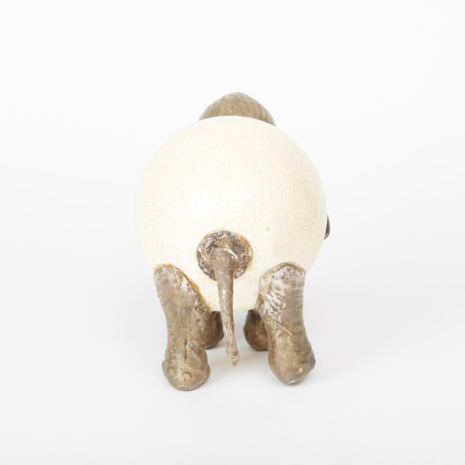 A set of peacock and elephant sculptures by the British Post-War/Contemporary designer Anthony Redmile. With details created in silver, the ostrich egg art objects are some of Redmile's most signature designs. Born in 1940, Redmile was known for