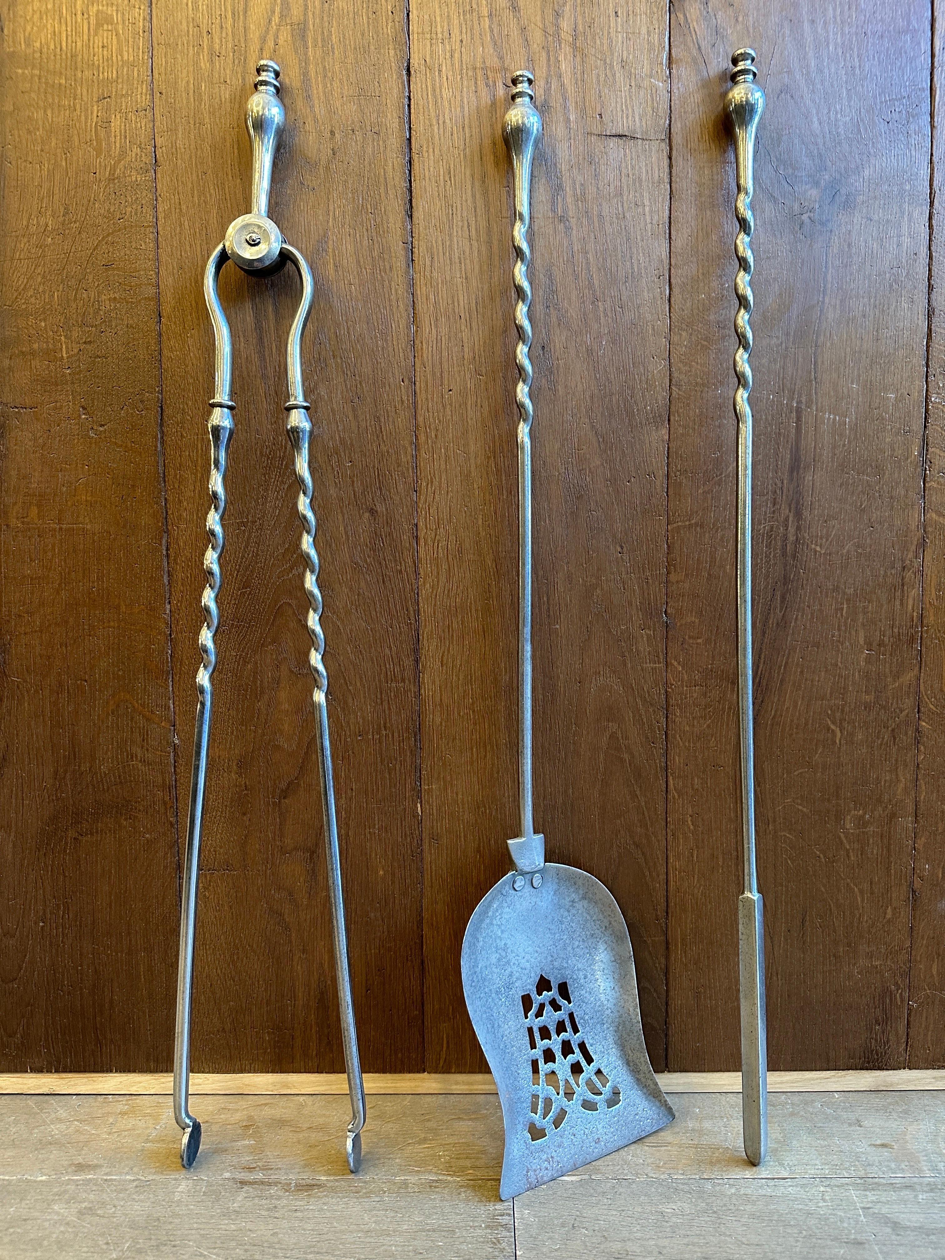 A set of polished barley twist fire irons/tools from the early to mid 19th century. In good order with finial handles, Barley twist stems, pierced shovel.
English late Regency or Early Victorian period 