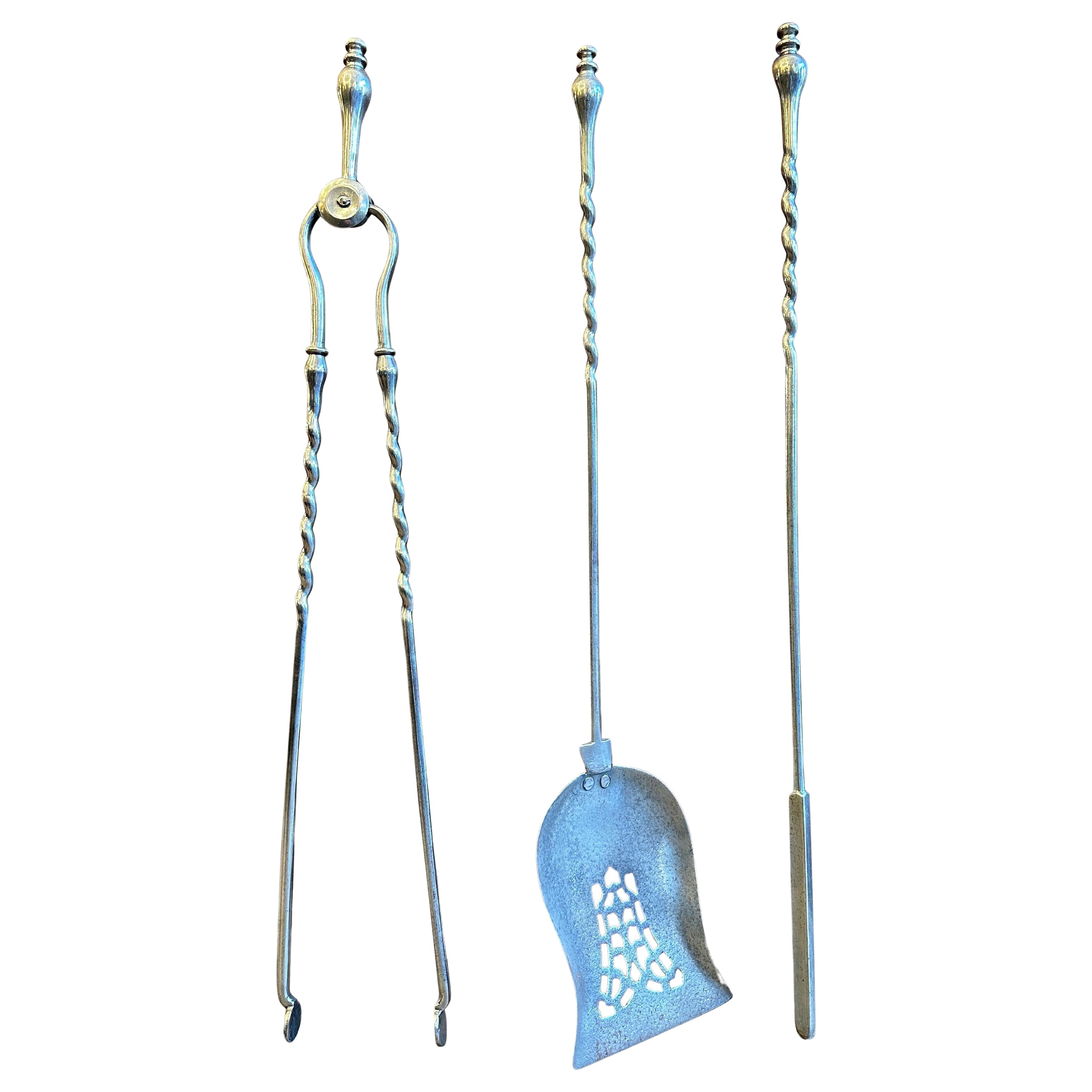 A Set Of Antique Polished Steel English Fire Tools For Sale