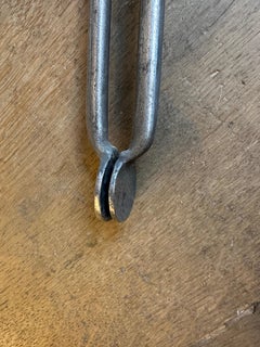 A Set Of Antique Polished Steel Fire Tools