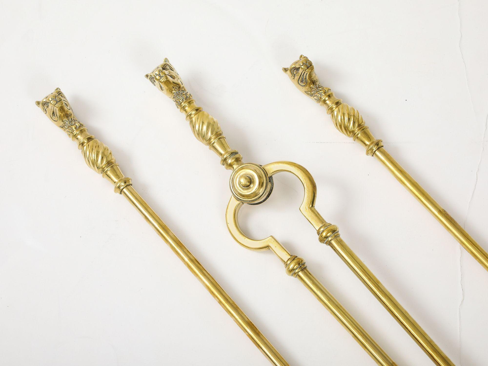 English A Set of Brass Leopard Head Andirons For Sale